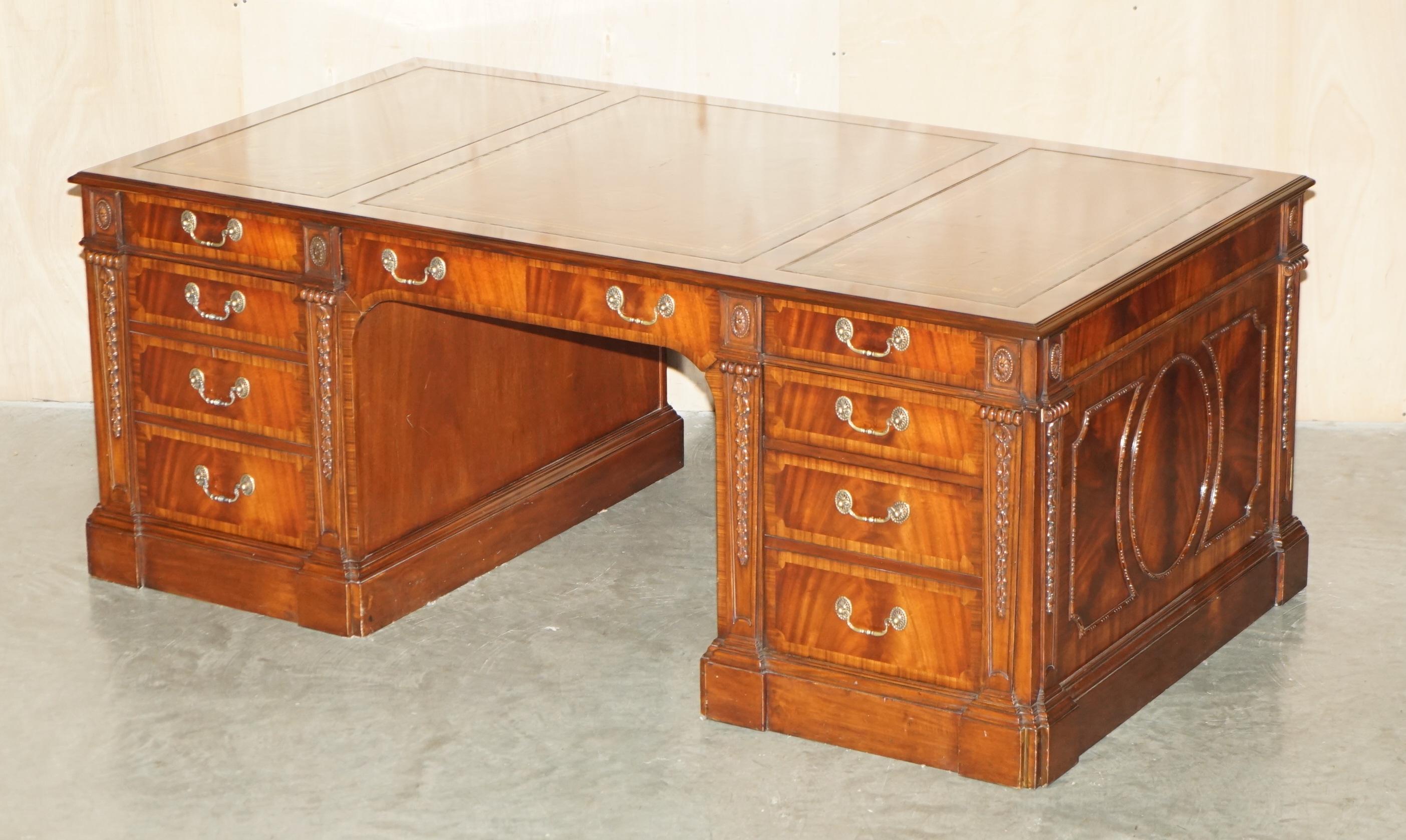 Royal House Antiques

Royal House Antiques is delighted to offer for sale this Museum quality, fully restored extra large double sided twin pedestal partner desk with brown leather, gold leaf tooled three section writing surface 

Please note the