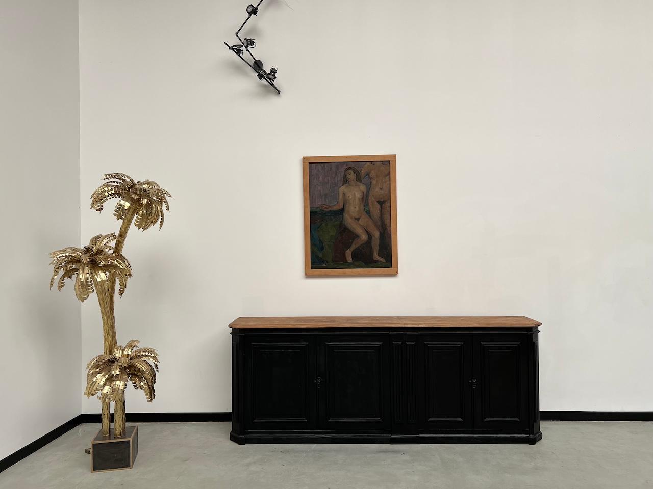 Fully restored 1900s pine sideboard
We restored this pretty sideboard by painting its facade matte black, and treating and sanding the interior.

Elegant and distinguished, it brings the charm of the old into any interior. Its varnished shelves, in