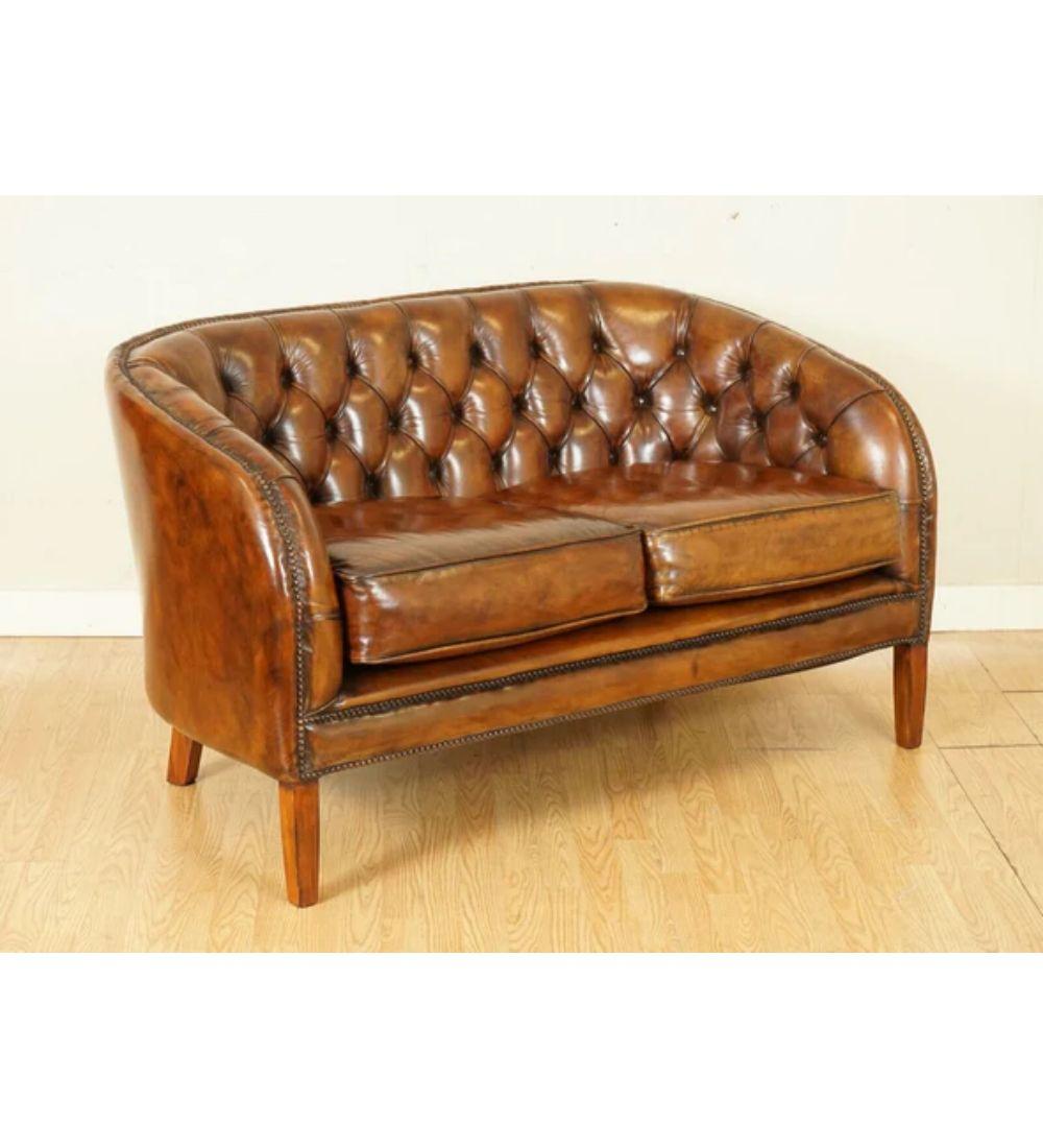 We are delighted to present this Gorgeous Art Deco Style fully restored whiskey brown hand-dyed leather sofa.

Condition the sofa has been fully restored, it has been washed back and hand dyed six times, antiqued, sealed and waxed, the idea with