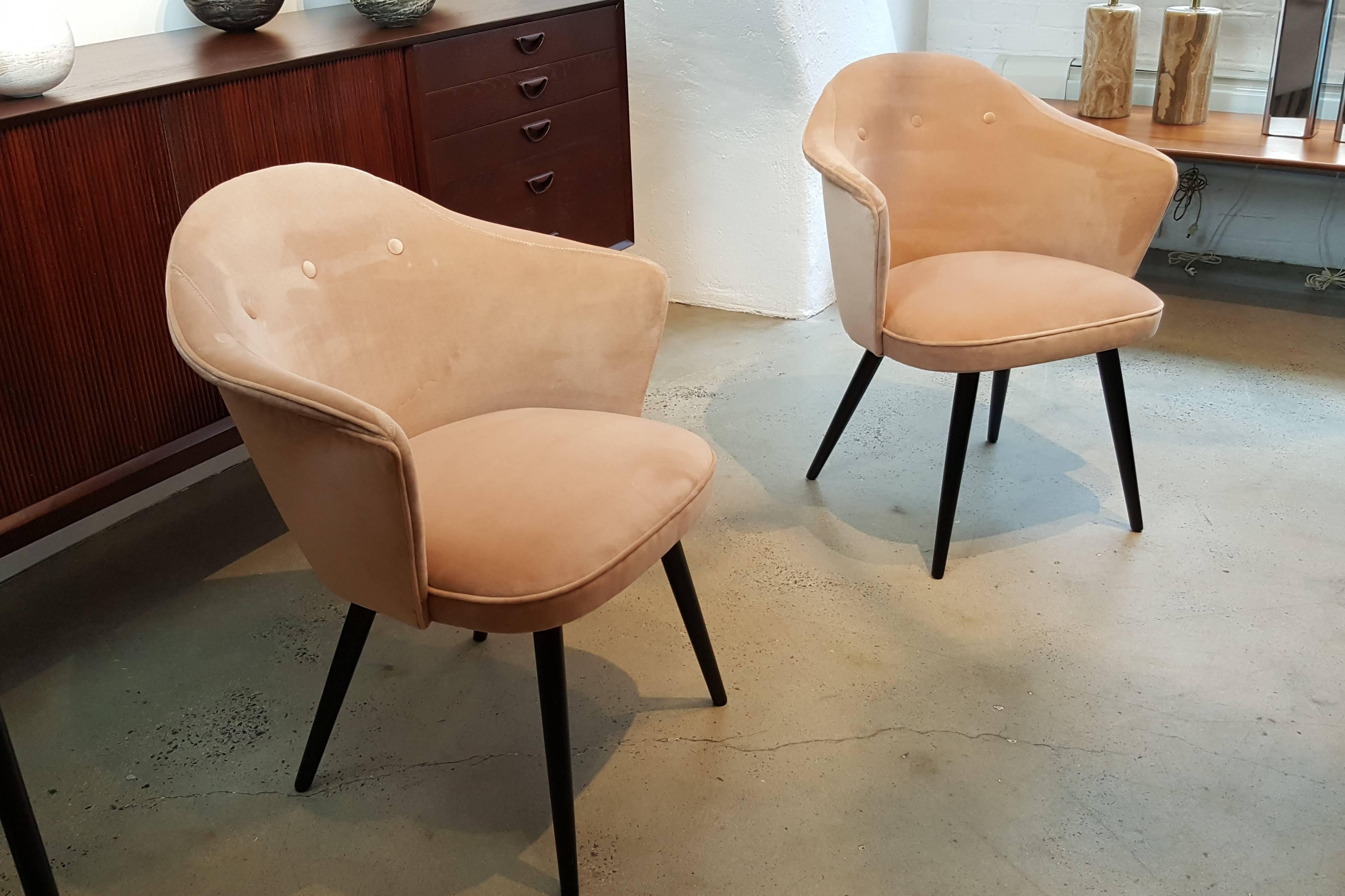 Striking, sculptural pair of Italian midcentury occasional chairs fully restored in a luxe, soft blush velvet. These chairs have such lovely details and are gorgeous from every possible angle. These sit quite comfortably. Nice scale for living room,