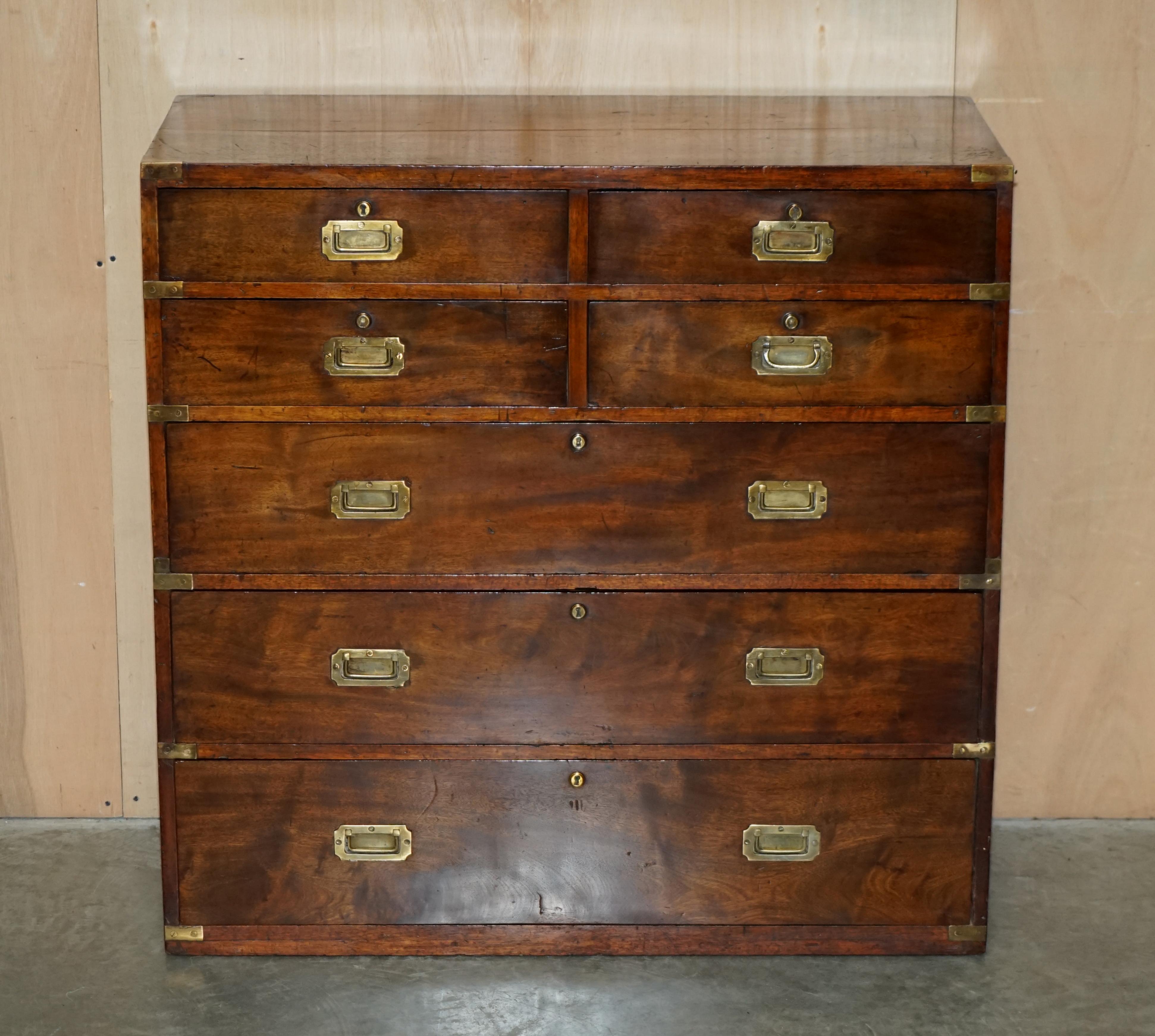 We are delighted to offer for sale this original Antique circa 1860-1880 fully restored Military Campaign chest of drawers in Honduras Mahogany with super rare four over three drawer configuration 

A very rare and desirable piece of military