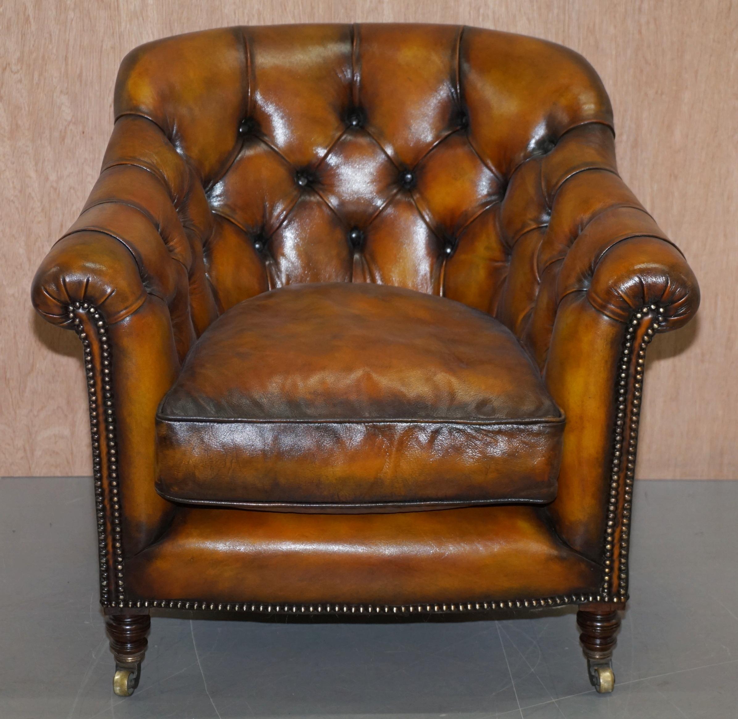 We are delighted to offer for sale this very rare original Howard and Sons stamped with original castors Victorian fully restored hand dyed brown leather club armchair

Never again will you see such a fine period example, the inside back leg is