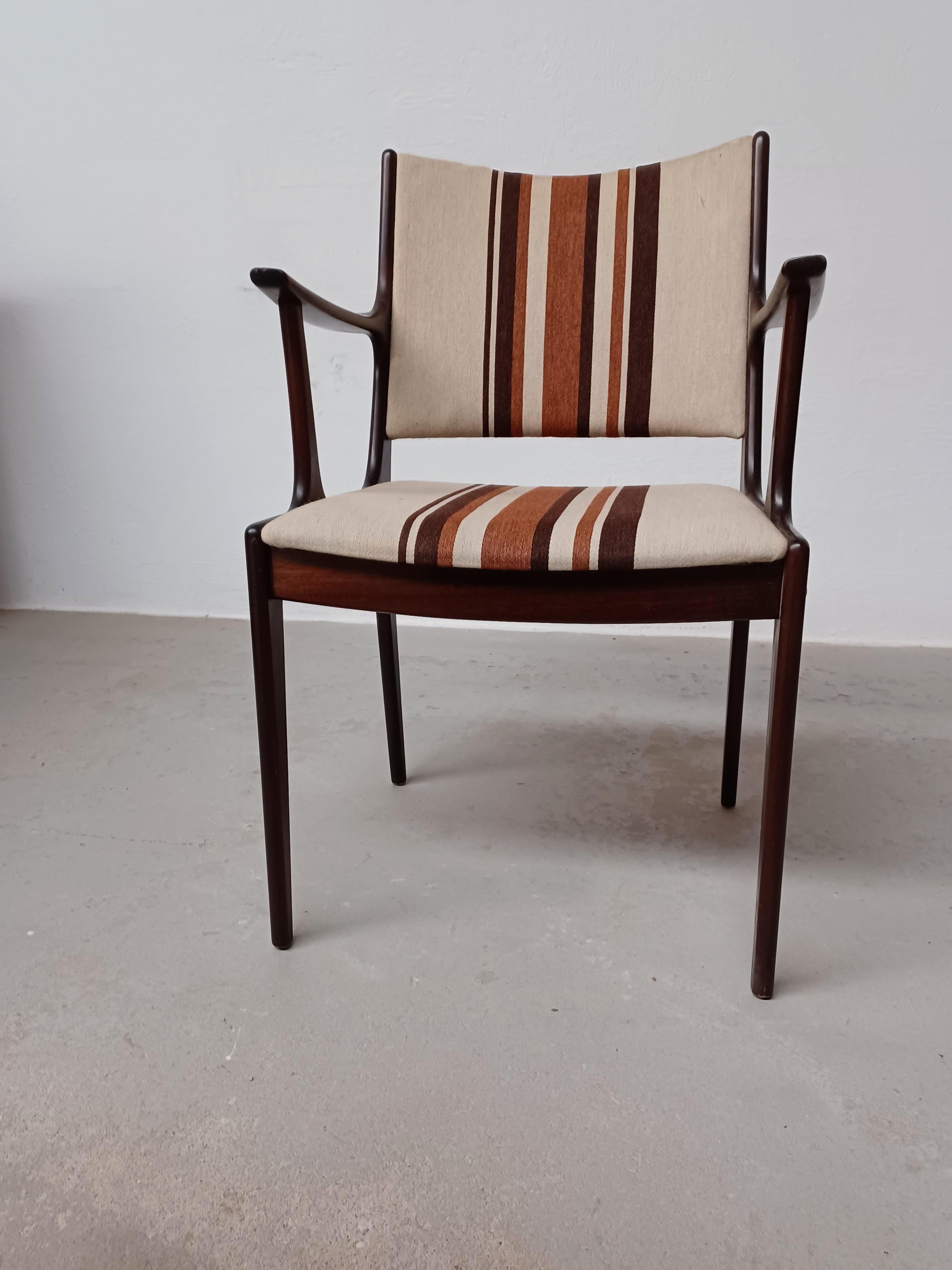 Fully restored Johannes Andersen mahogany armchairs custom reupholstery included

The armchairs feature a clean simple yet elegant design that will fit in well in most houses. 

The chairs have been fully restored and refinished by our cabinetmaker