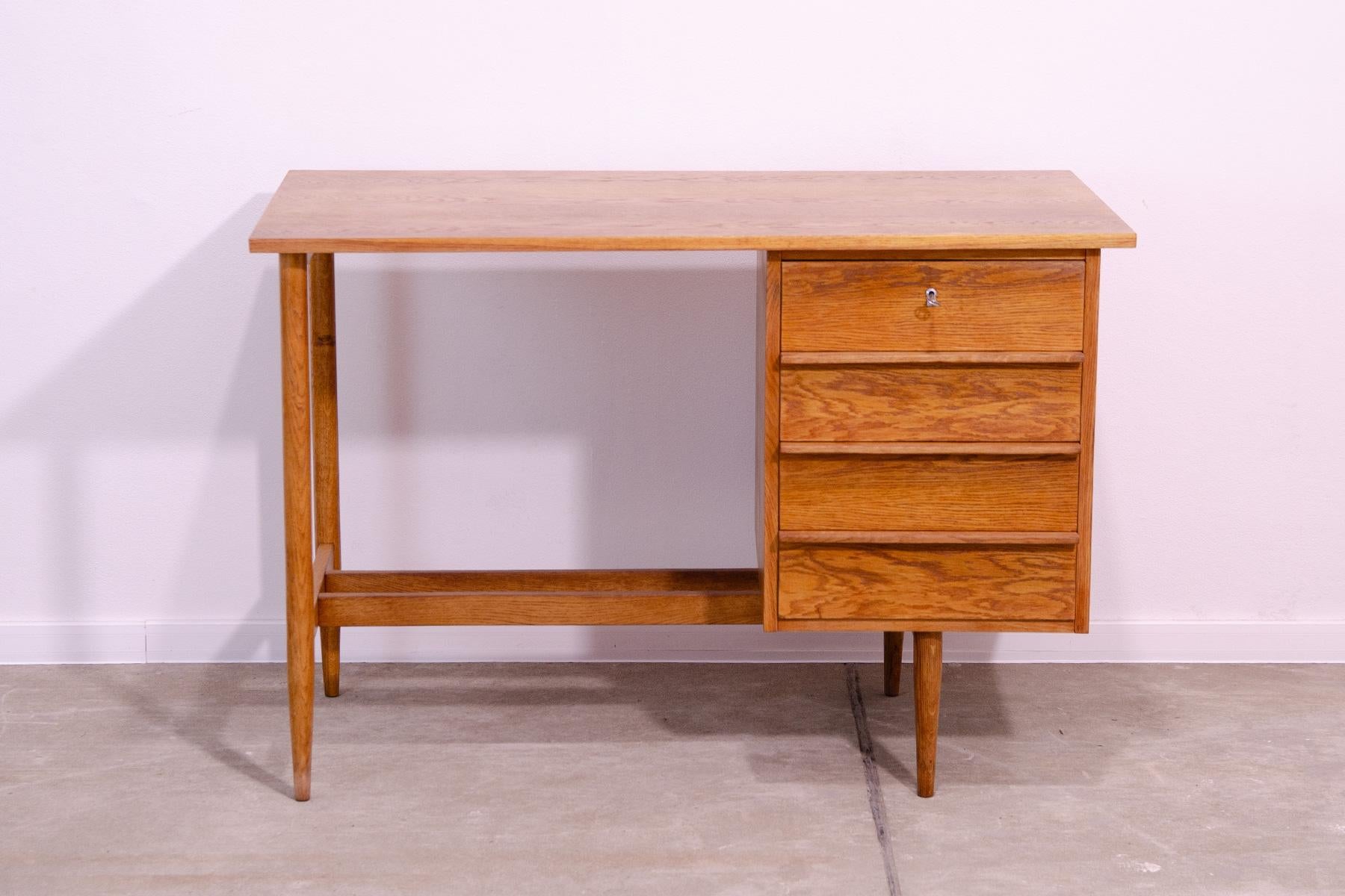 This midcentury  ladies writing desk was made in the former Czechoslovakia in the 1960´s. It’s made of beech wood. Plastic drawers inside. Very simple design. In excellent condition, fully renovated.

Dimensions:

length: 110 cm, height: 75 cm,