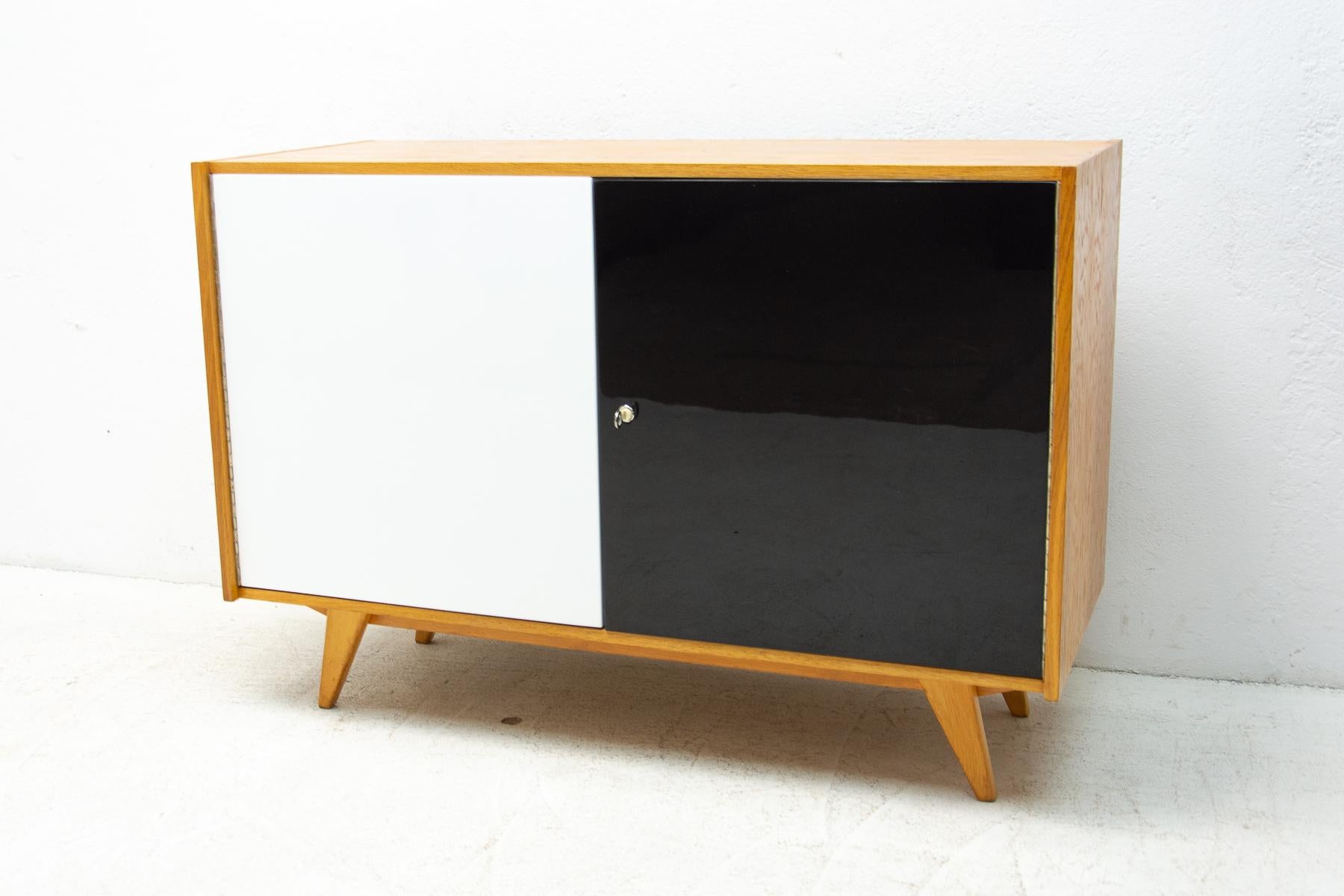 Midcentury sideboard-cabinet, catalogue No. U-450, designed by Jiri Jiroutek. It´s made of beechwood, veneer, plywood and laminate. In very good condition.

The cabinet comes from the famous Universal series (U-450), which was designed in 1958 for