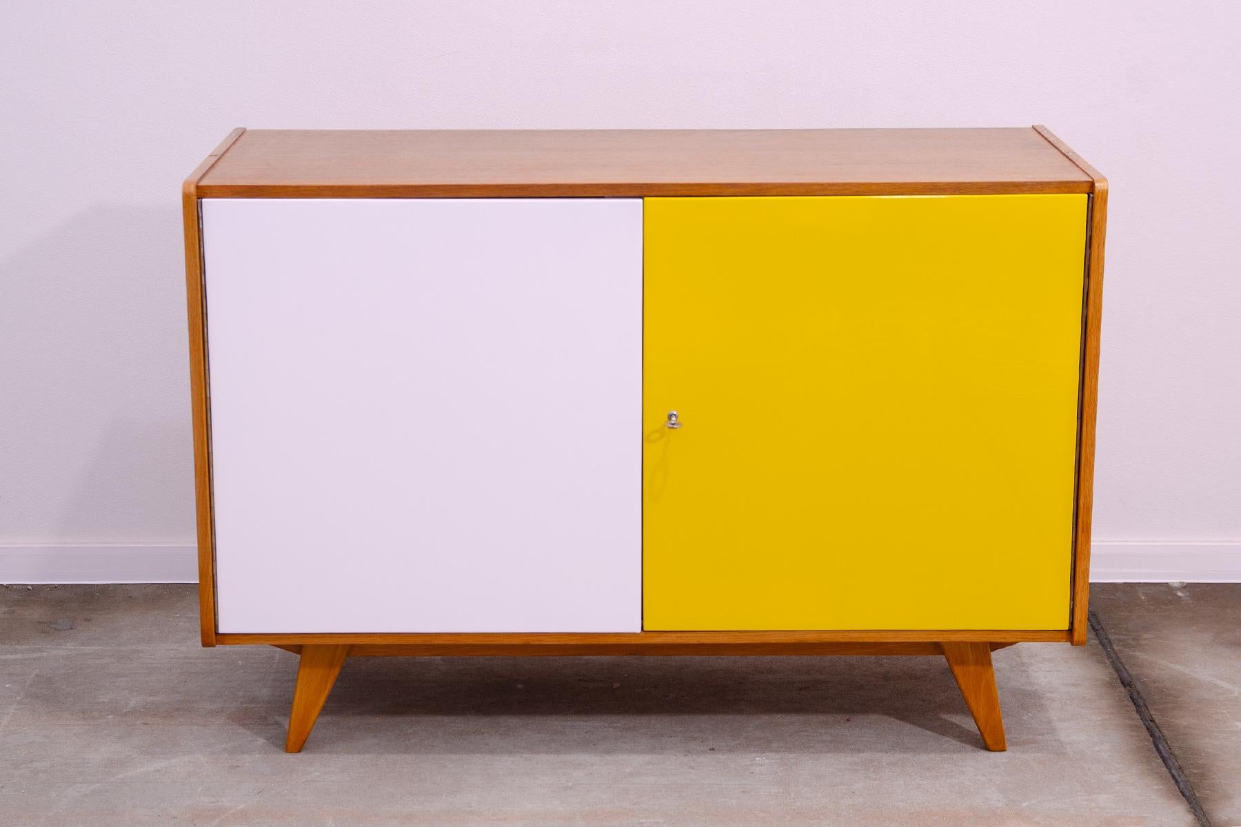 Mid century sideboard-cabinet, catalogue No. U-450, designed by Jiri Jiroutek. It´s made of beechwood, veneer, plywood and laminate. In very good condition.

The cabinet comes from the famous Universal series (U-450), which was designed in 1958 for