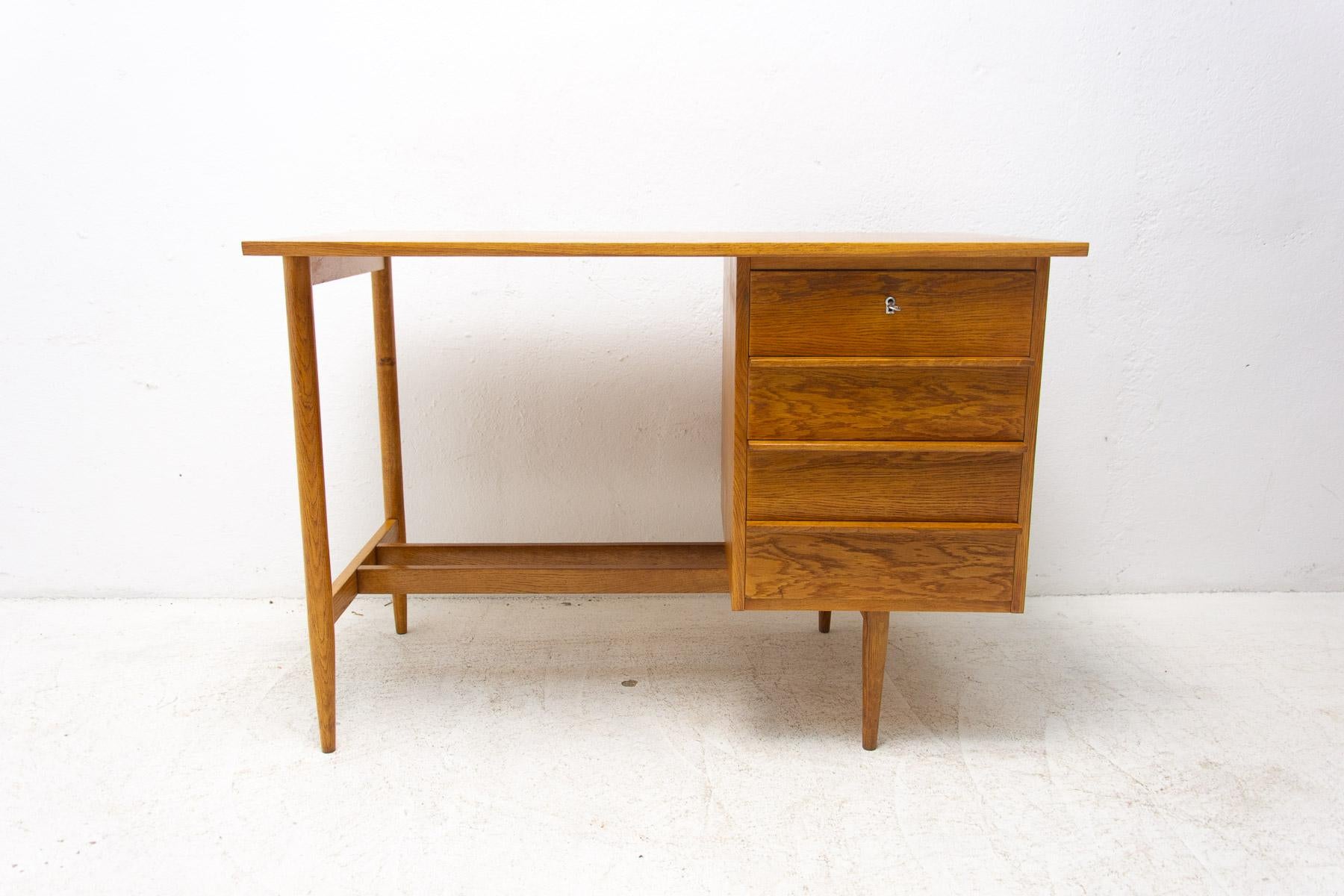 This ladies writing desk was made in the former Czechoslovakia in the 1960´s.

It's made of beech wood. Plastic drawers inside.

Very simple design. In excellent condition, fully renovated.

Dimensions:

length: 110 cm, height: 75 cm, depth: 60 cm.