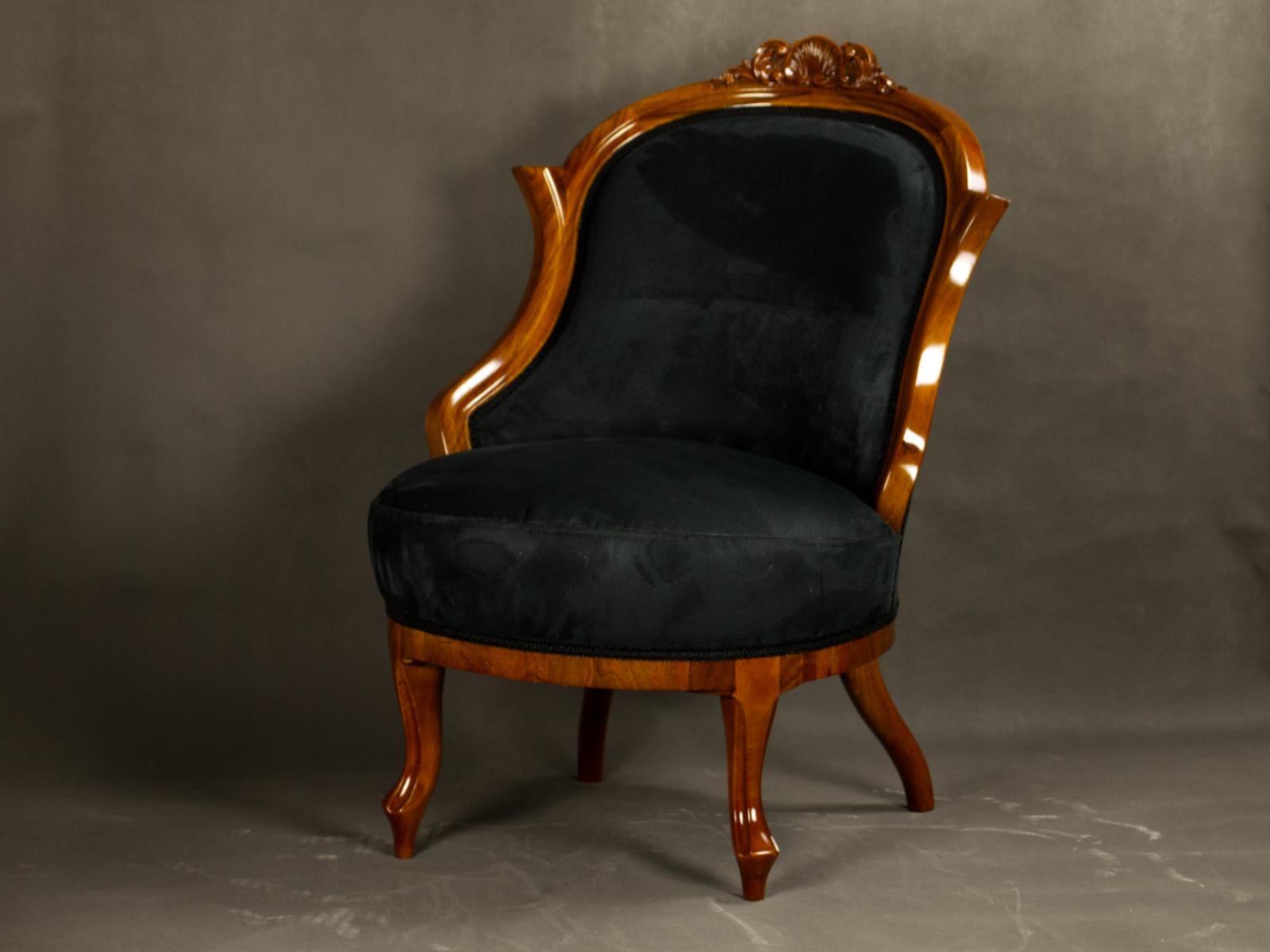Pair of beautiful Biedermeier Armchairs / chairs, mid 19th century from Vienna, Austria. Walnut veneered on the backs and solid walnut legs. Chairs are restored and French polished. Newly upholstered with black fabric. Upholstered in the traditional
