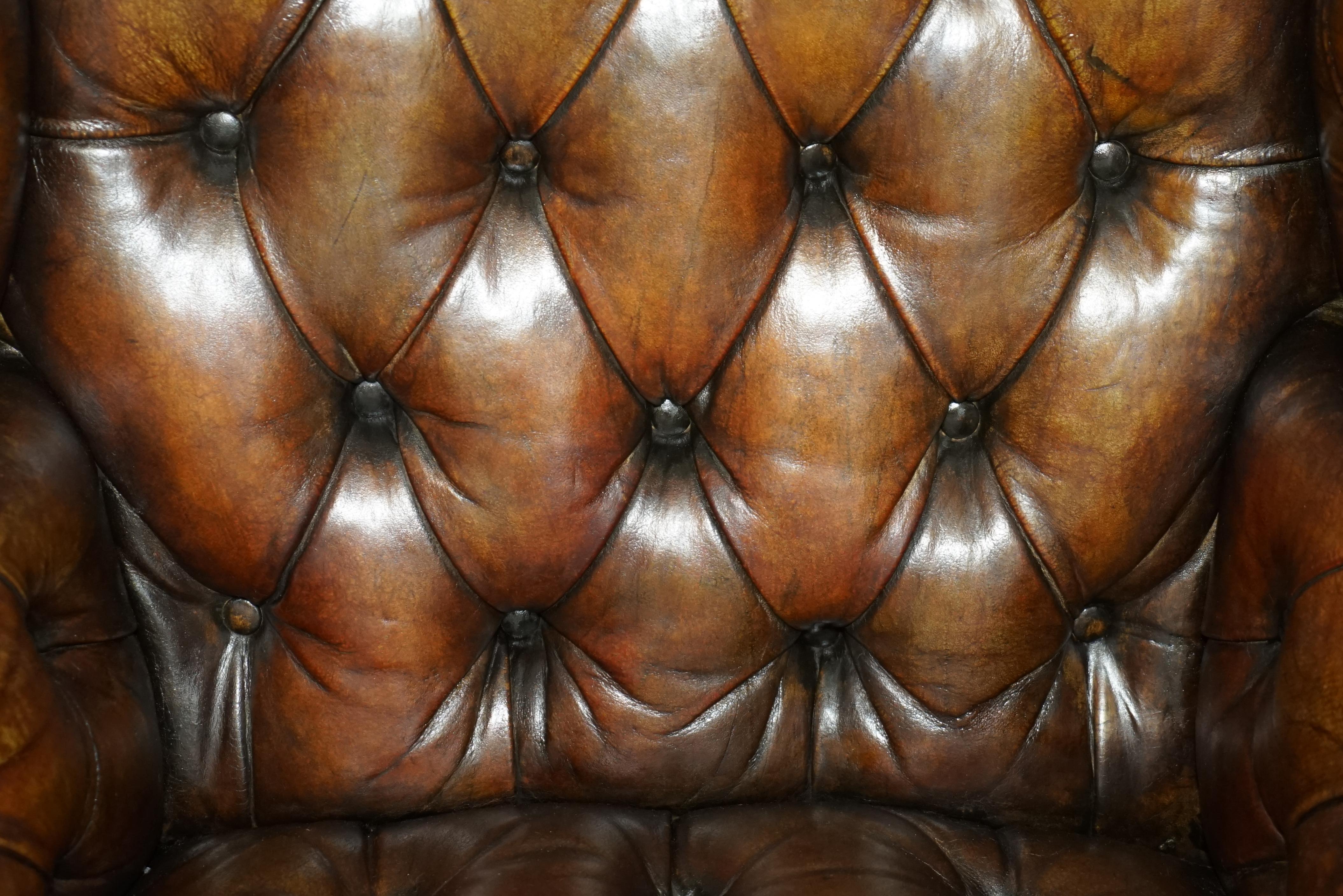 Leather FULLY RESTORED PAIR OF HAND DYED BROWN LEATHER CHESTERFiELD WINGBACK ARMCHAIRS For Sale