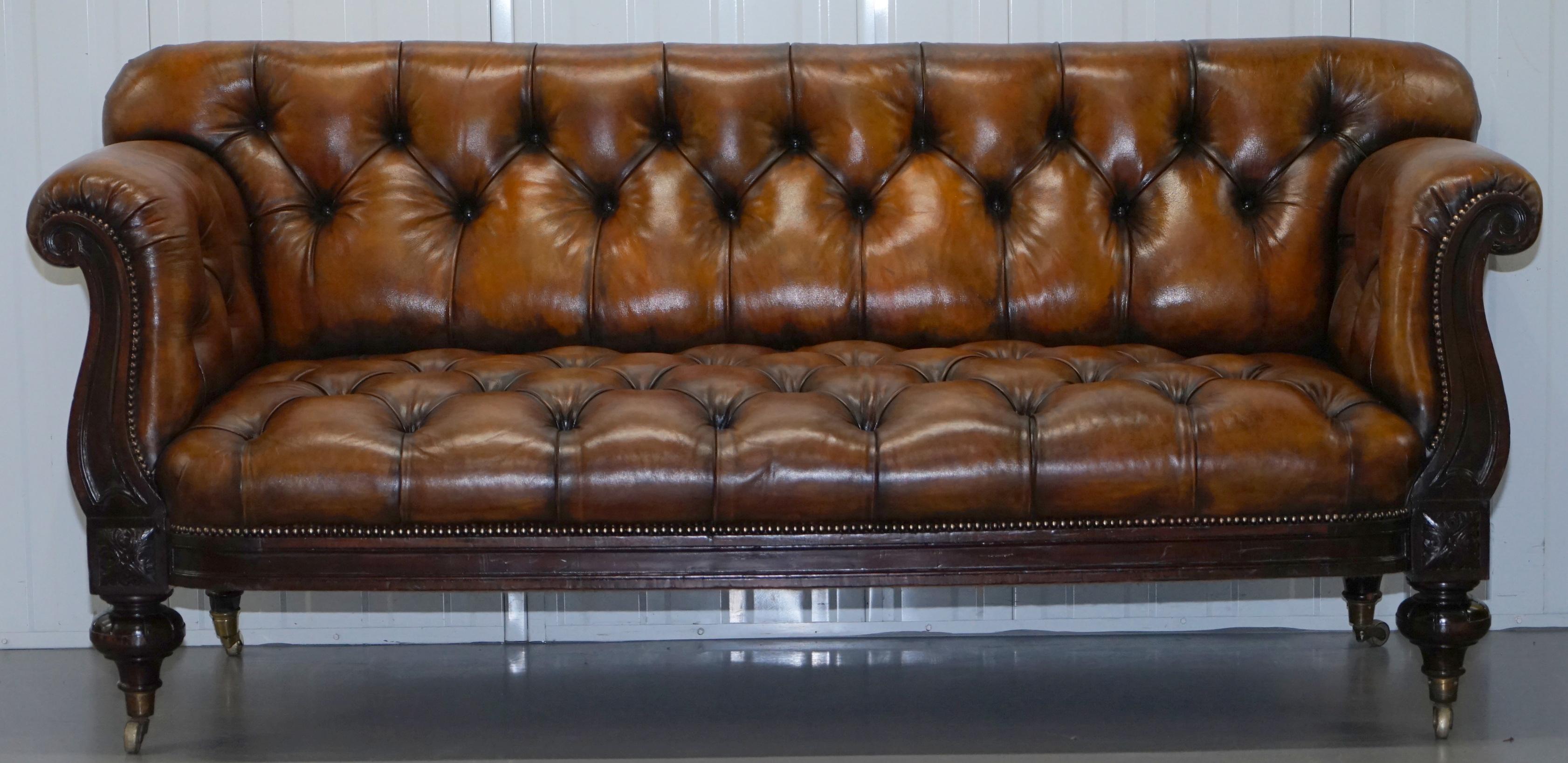 We are delighted to offer for sale this very rare fully restored Chesterfield Victorian show frame sofa in rosewood with hand dyed brown leather

This sofa has been on a journey, it came to me with horrifically worn leather upholstery which was