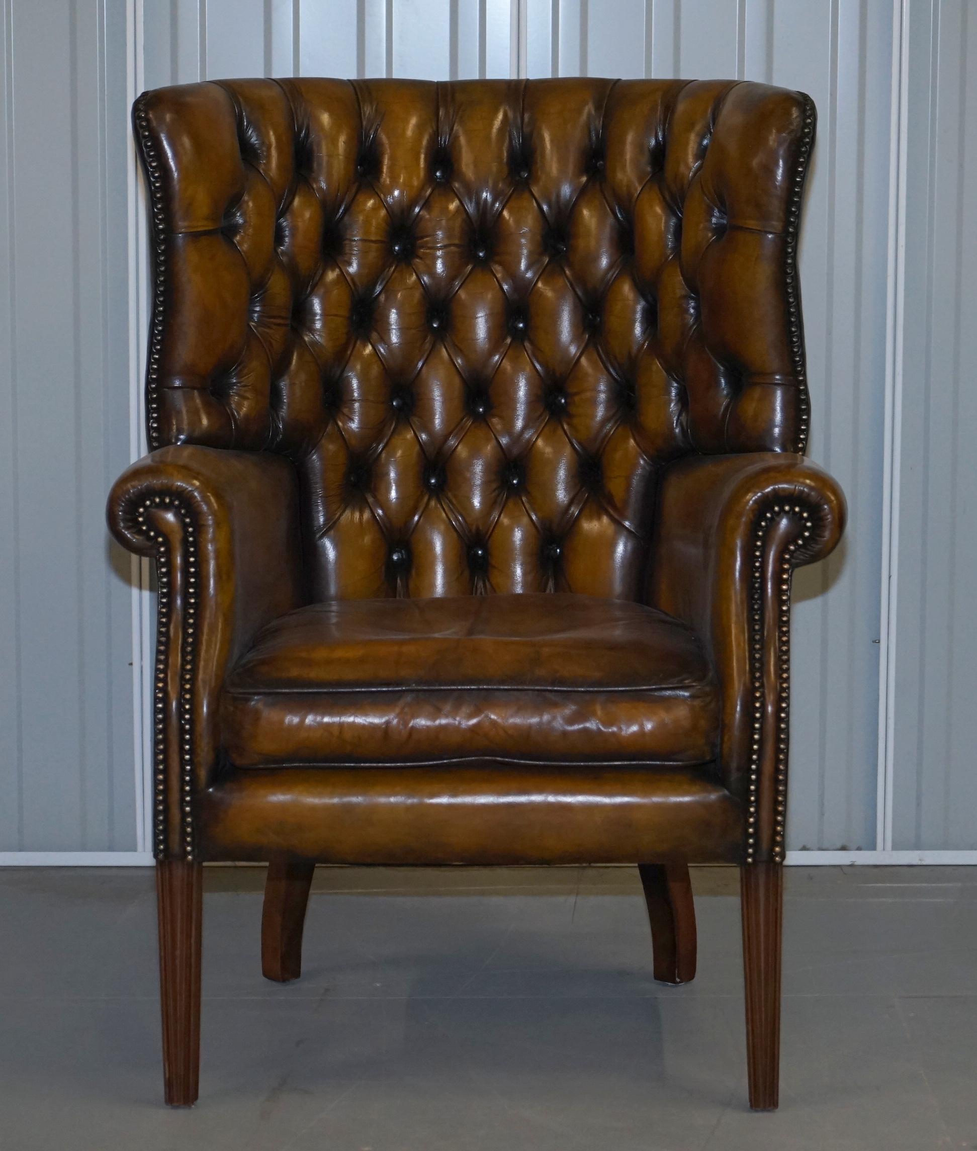 We are delighted to offer for sale this stunning vintage Porters barrel back armchair in whisky brown leather 

This chair a real tour de force, is has absolutely everything going for it, the leather hide is original and hand dyed from new, the