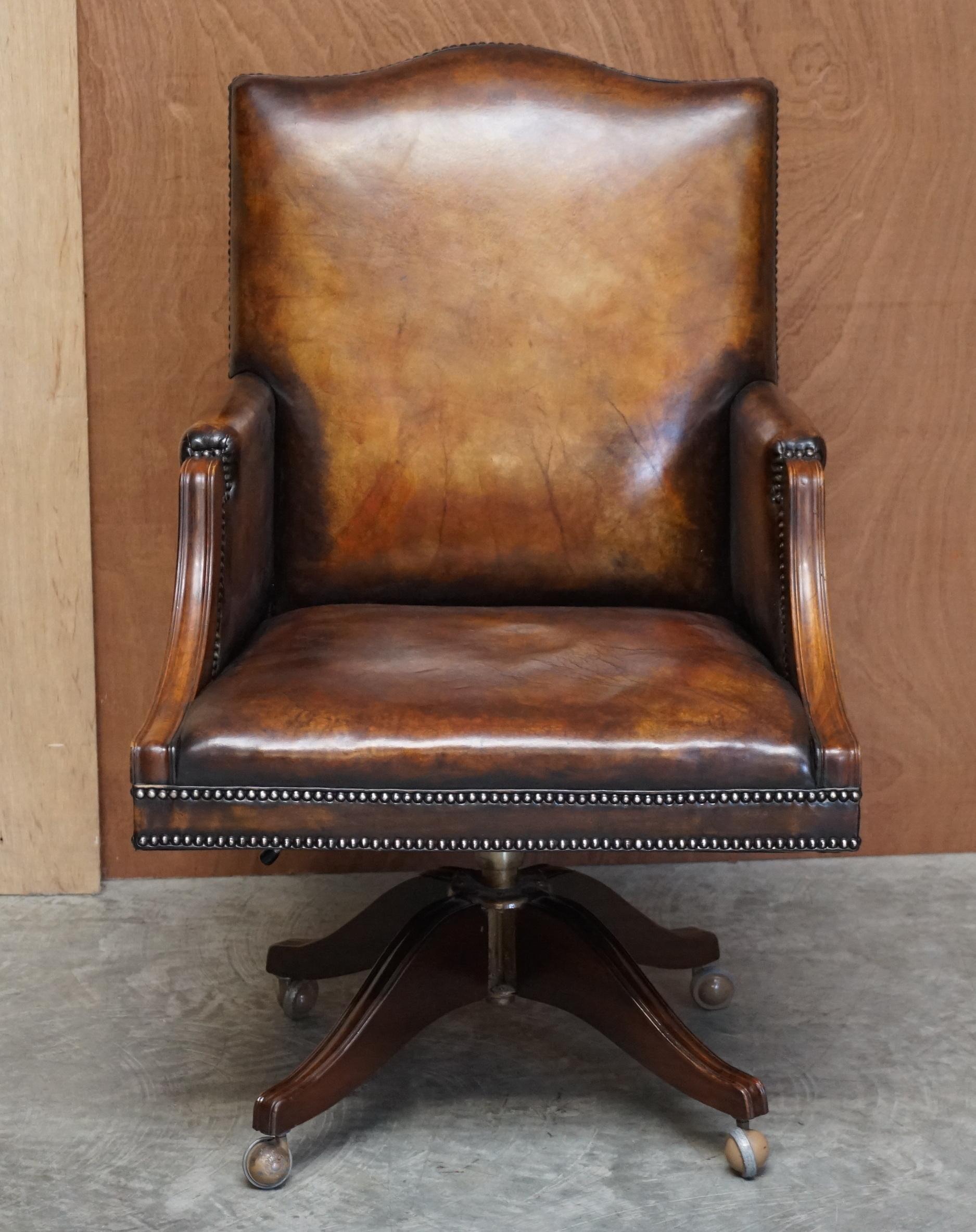 We are delighted to offer for sale this lovely fully restored original oak framed vintage hand dyed Whiskey brown leather directors chair.

A very good looking well made and comfortable directors chair, I've not seen one with a solid oak frame