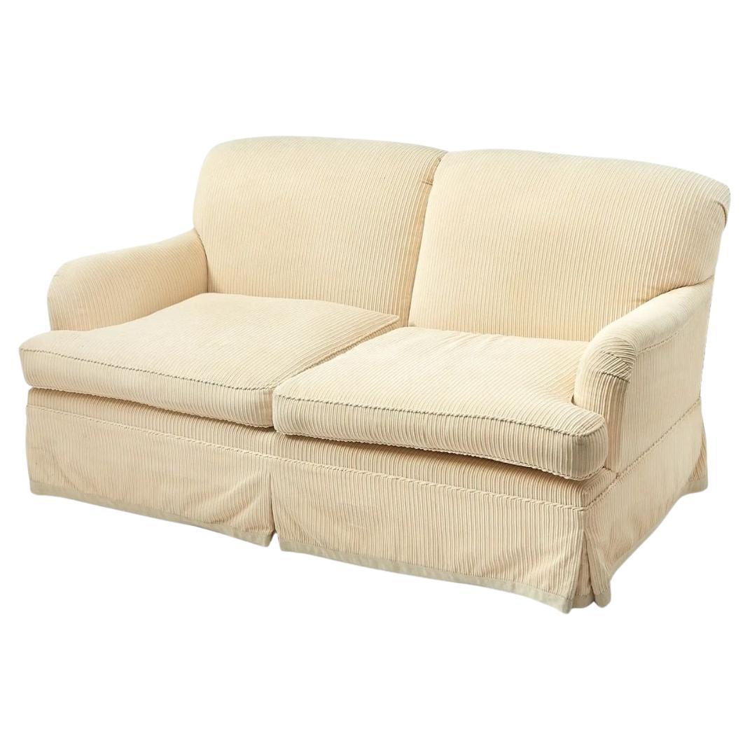 Fully Upholstered and Skirted Cream Loveseat For Sale