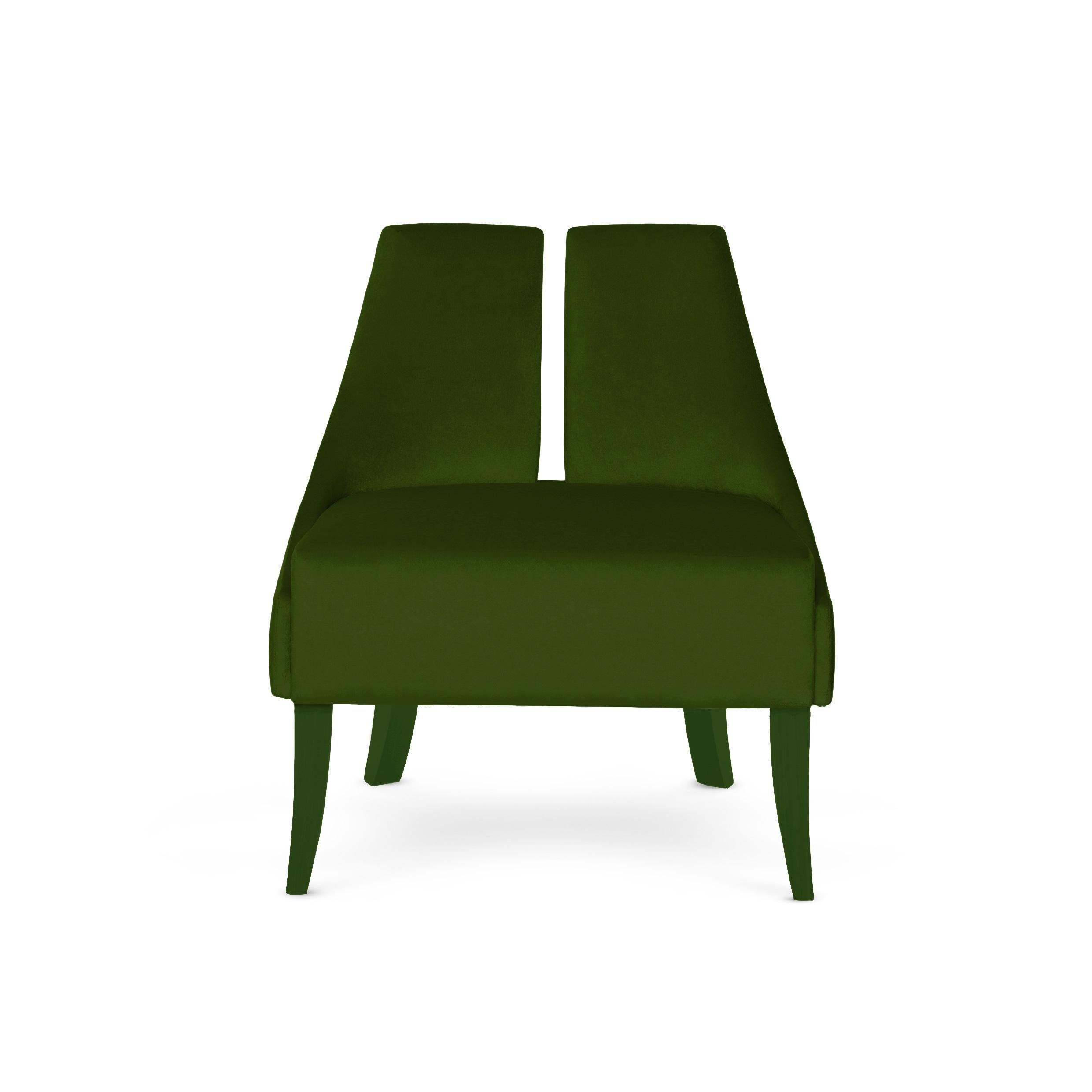 Drawing from the impossibly elegant waistlines of the pin ups, this armchair is a sensuous piece that offers a generous seat. The seaming details are exquisitely crafted, like a silhouette adorning corset.
Upholstery: Velvet 
Legs: Available