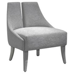 Poltrona completamente imbottita con Silhouette classica di Munna
