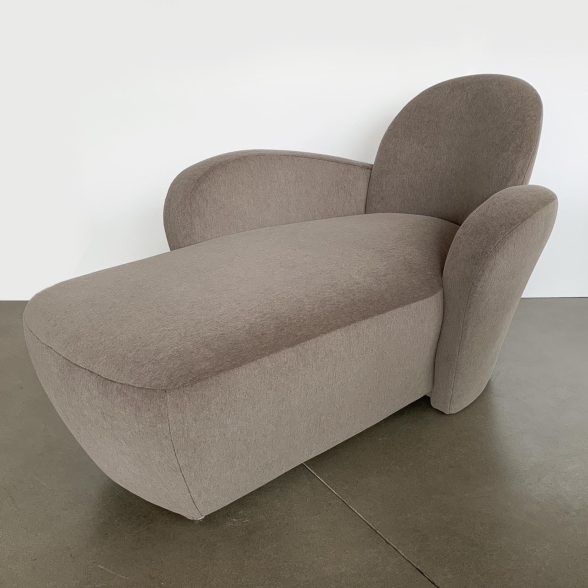 A custom fully upholstered 