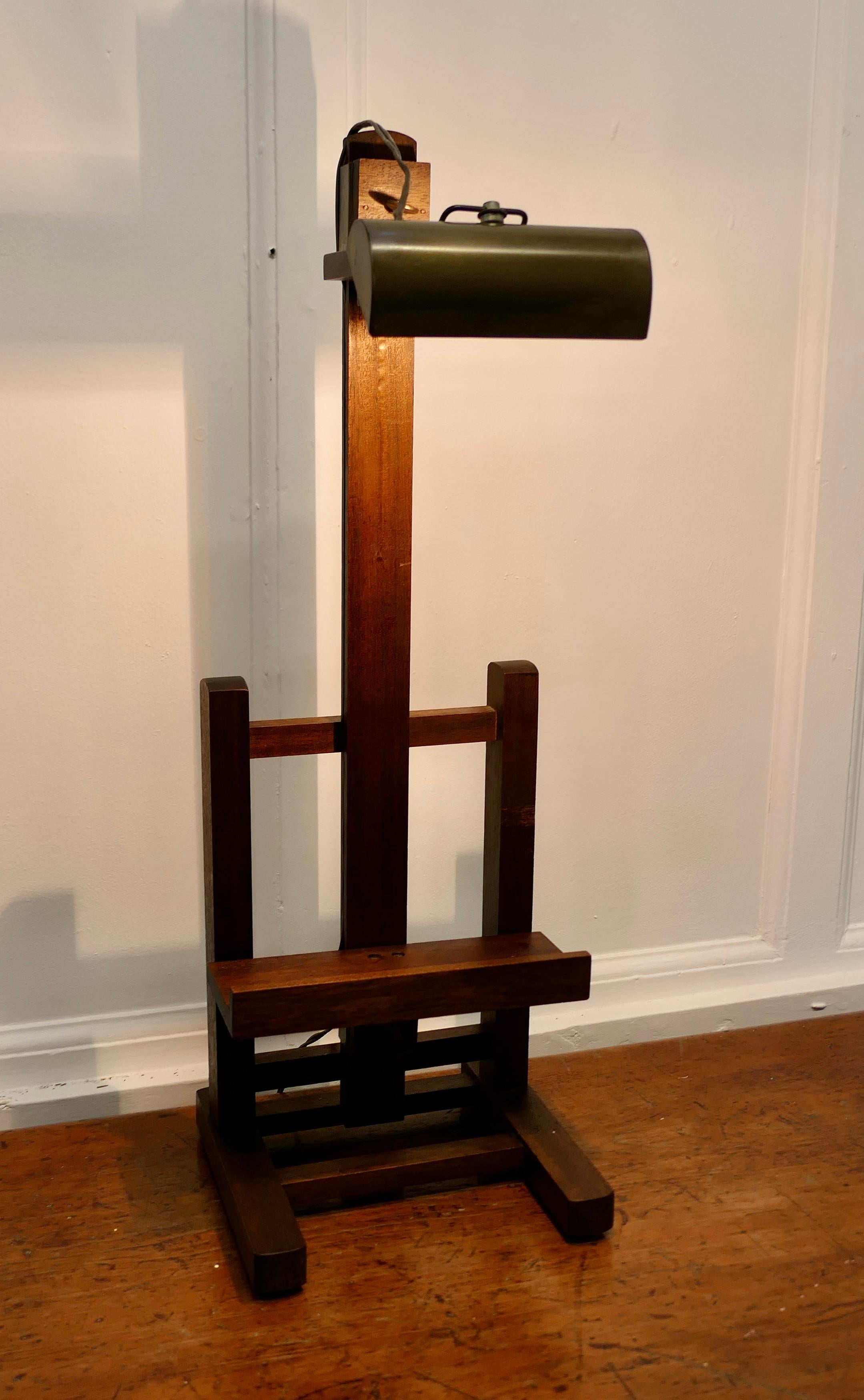 Fully Working Table Top Easel Reading Stand Lamp 

 A great little piece, this is a table top easel which is mounted with an adjustable reading lamp so it can be used for both books and paintings
The stand is 25” tall, 9” wide and 8” deep
TMS106.