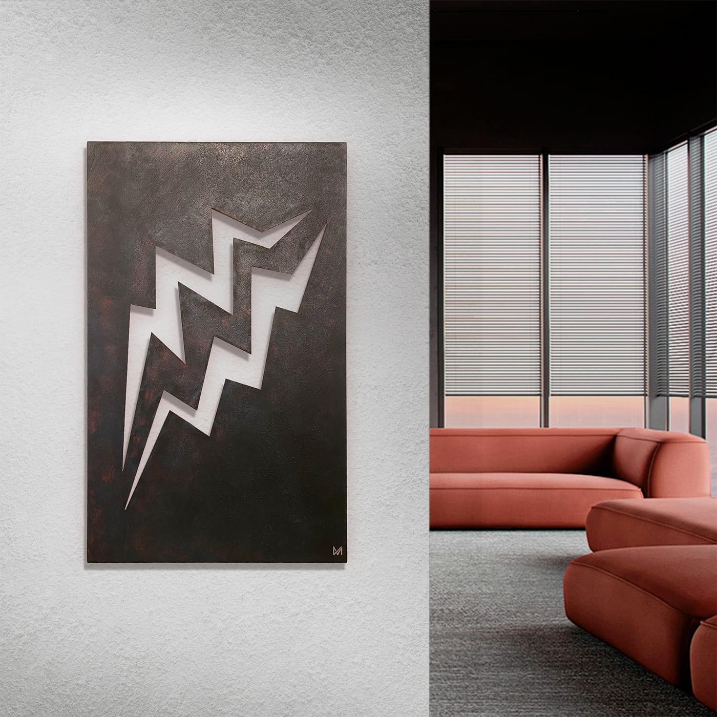 Showcasing a dynamic interplay of solids and voids in its singular balance of sculpture and painting, this distinctive Fulmini Burn panel is crafted in ultramodern gray finished aluminum and showcases a series of jagged cutouts expressing the energy