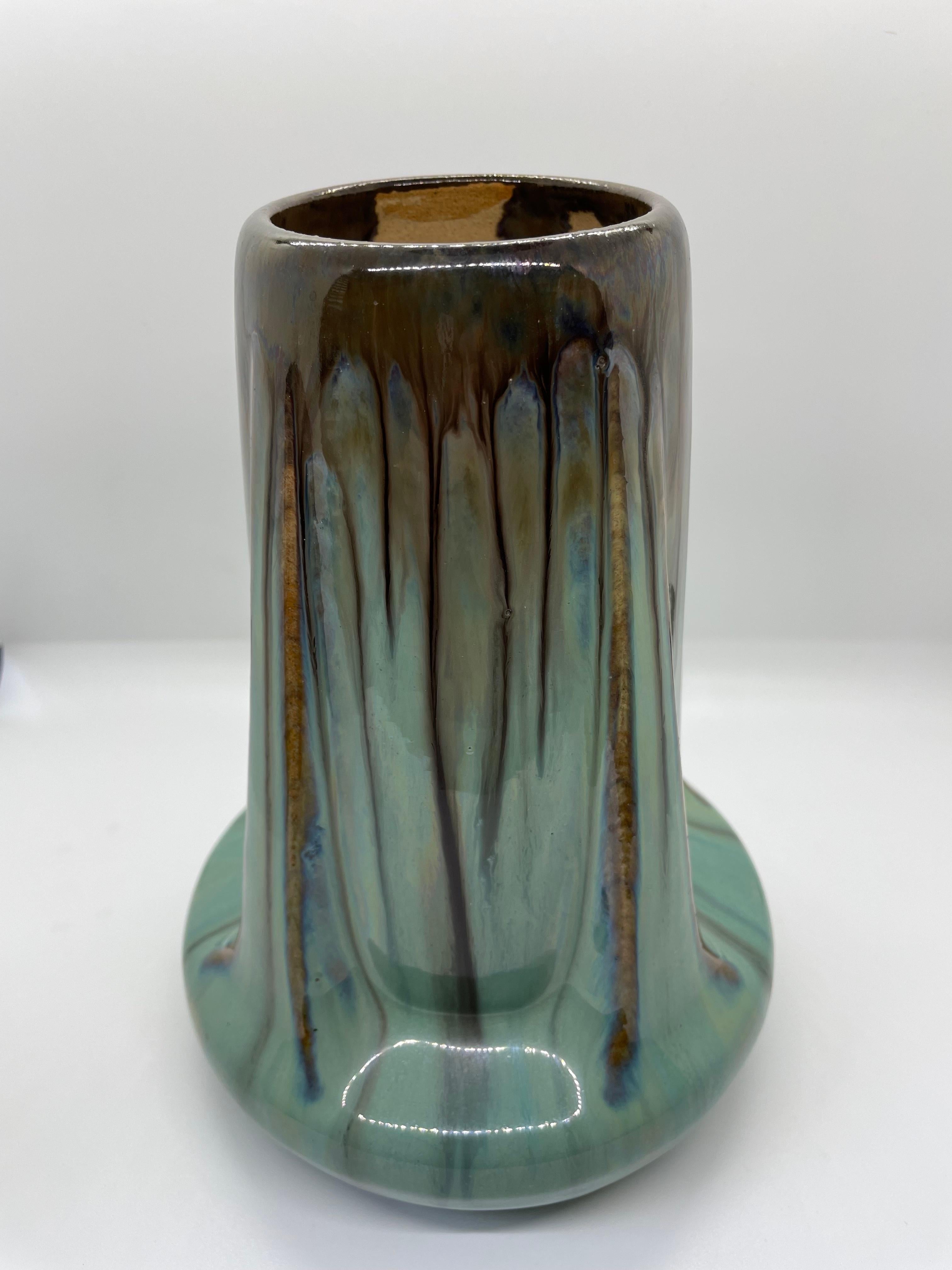 Fulper Buttress vase in gorgeous shades of green and brown. Lovely example of early 20th century American art pottery, made in New Jersey. a few tiny 'flea bites' in the glaze are from the original manufacturing process. Fantastic accent piece or