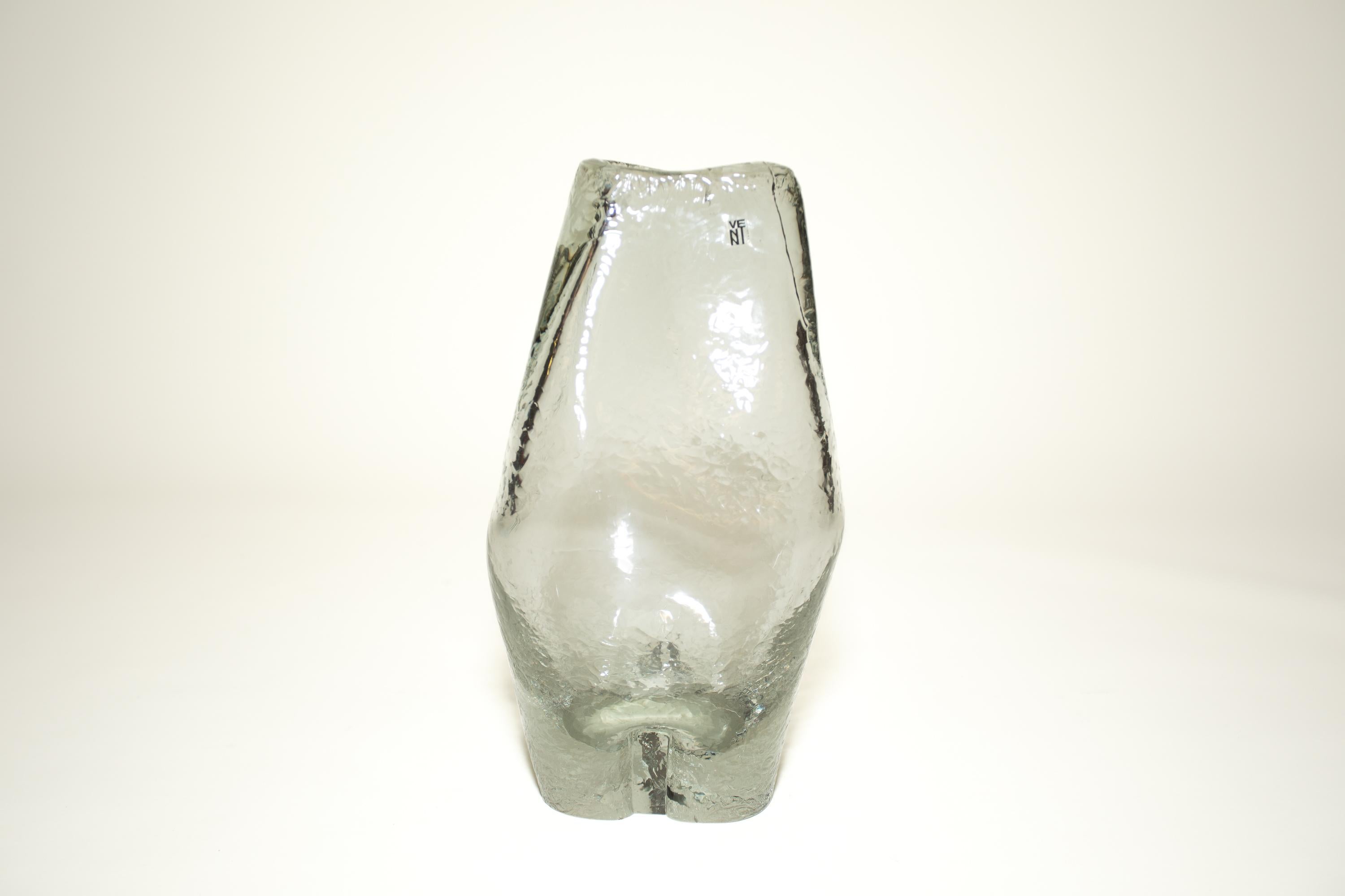 An original Venini Vase in Clear/Gray Textured Glass.
A large Vase in the form of of a Female torso.
Original Venini sticker and engraved Venini/ Italia signature.