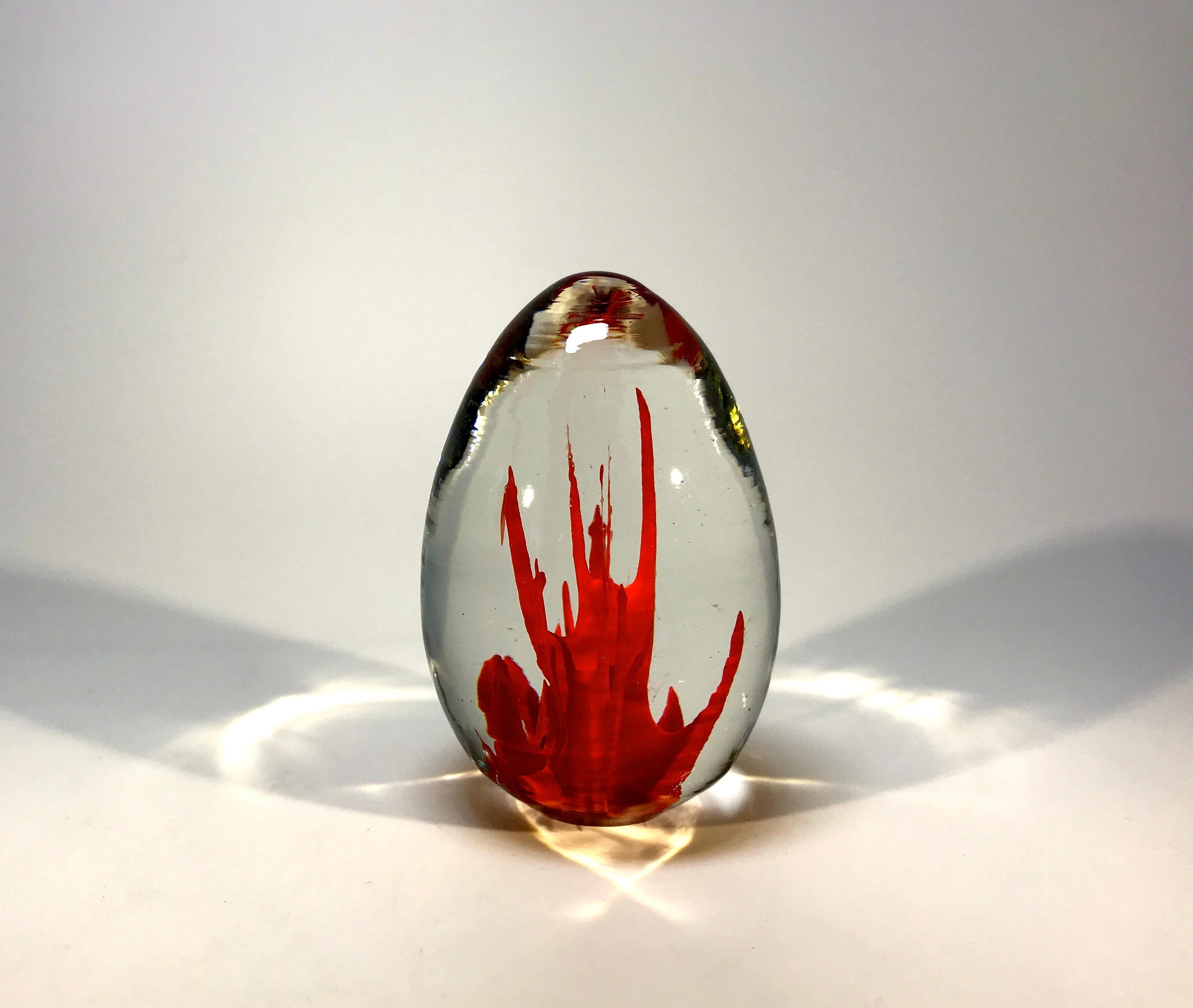 Fulvio Bianconi signed Venini hand blown egg paperweight with encased red coral form
Superb desk accessory
circa 1960s
Signed Venini, Italia, to base
Measures: Height 3 inch, width 2 inch
Very good condition with minor light scratches to the