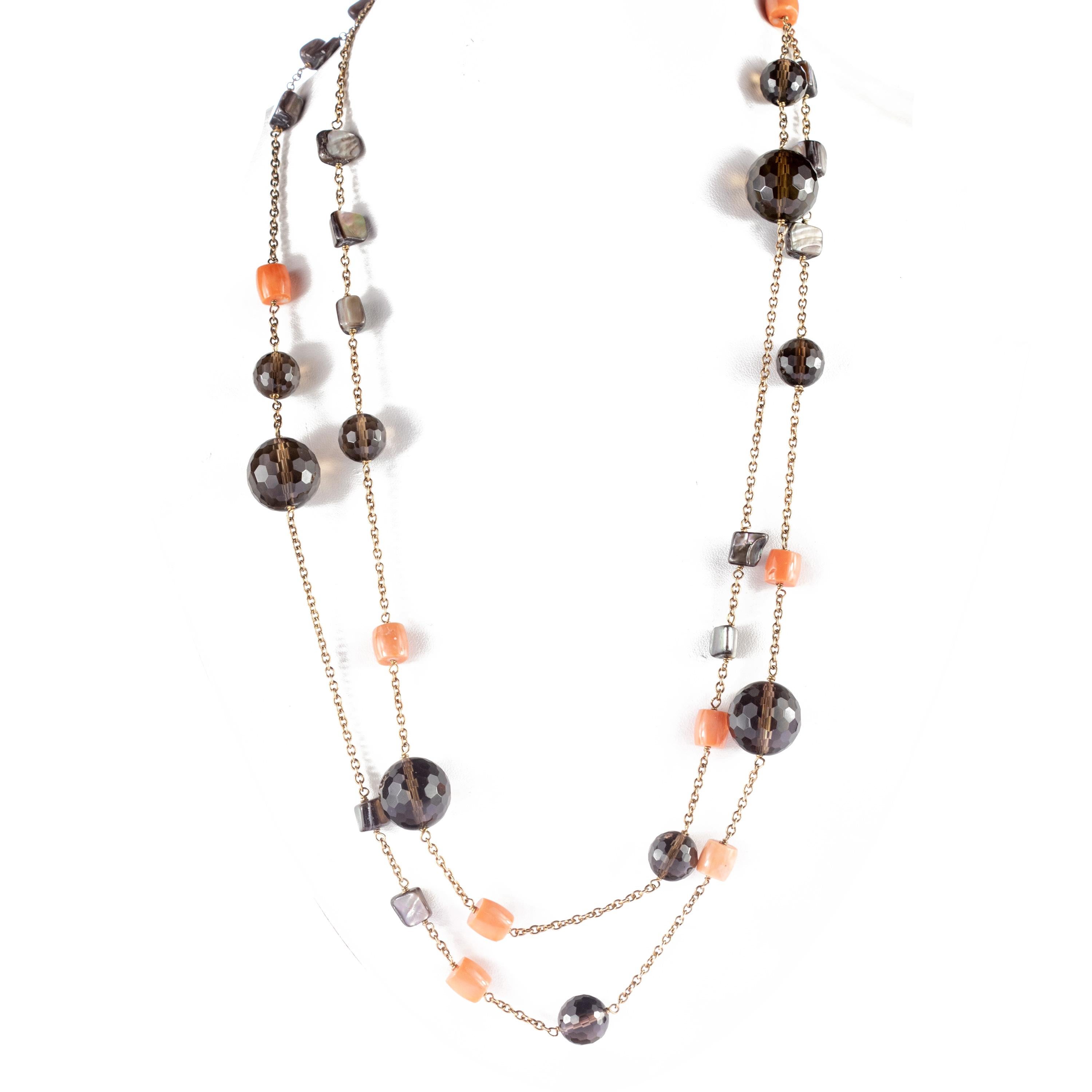 One of a kind impressive handmade precious fume quartz spheres, coral cubes and mother of pearl uneven cubes necklace.  Embellished with extraordinary colors evoking a volcano. Oranges, brown, whites and multiple hues come together to highlight a