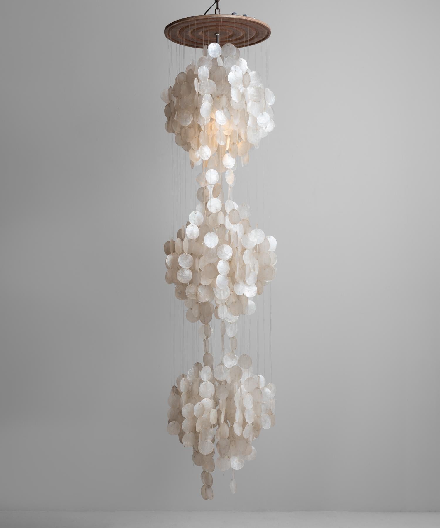 Fun 3DM chandelier by Verner Panton, Denmark, circa 1960.

Elegant, cascading capiz shell chandelier.