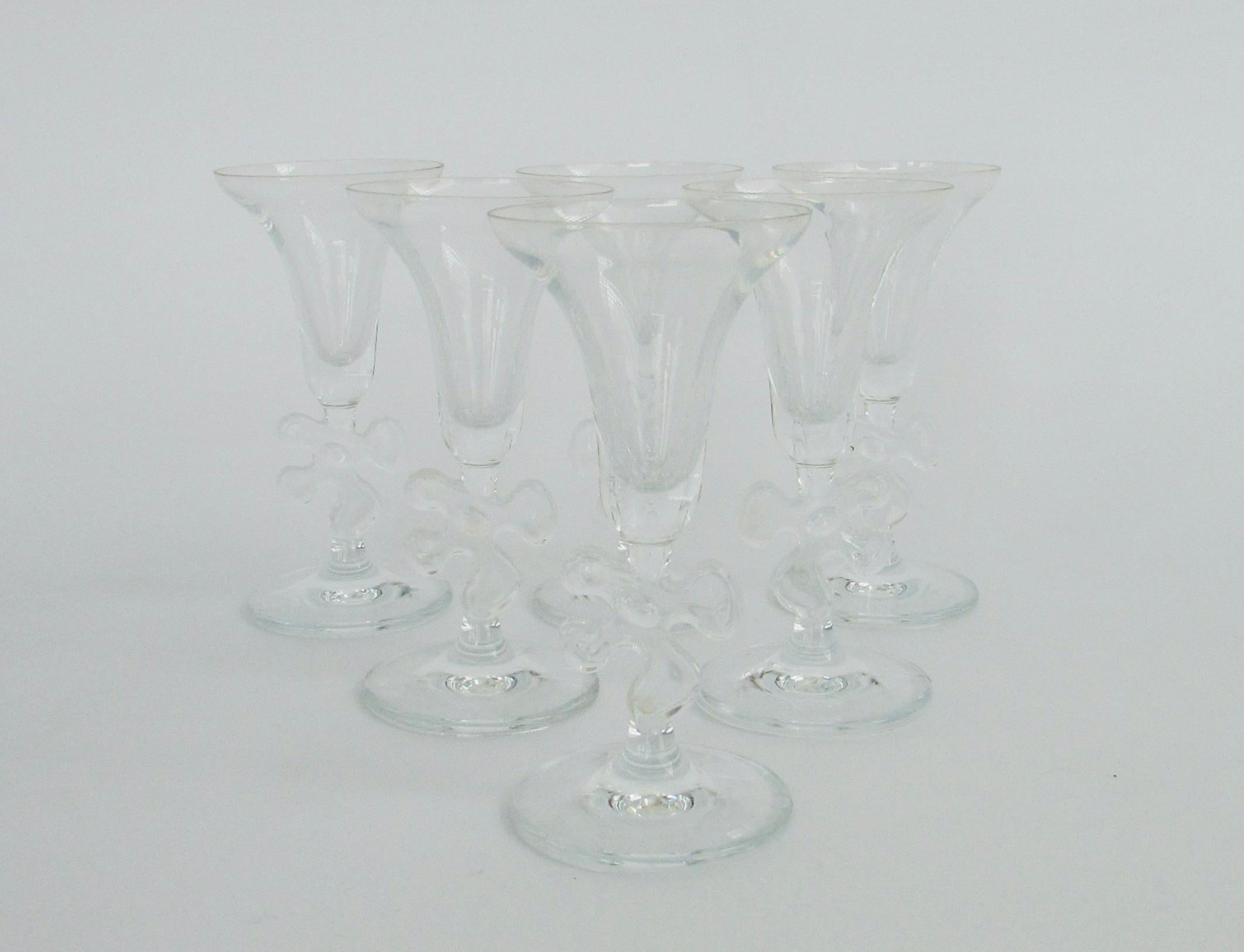 Six Elegant and whimsical cordial or aperitif glasses designed by Marc Aurel . Bell shaped glass on biomorphic jig saw stem . Acid stamped Marc Aurel .