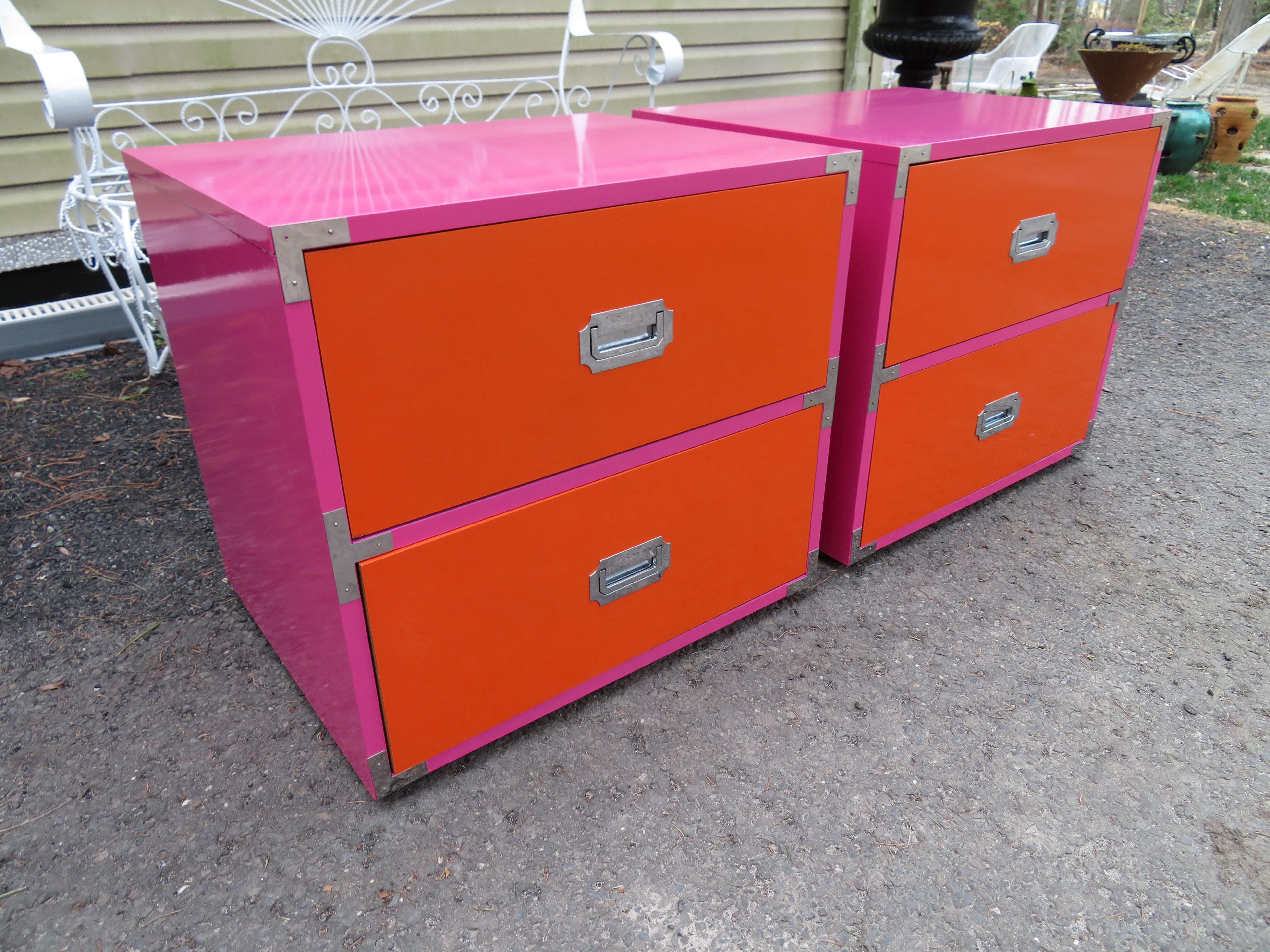 Fun pop colored pair of Campaigner nightstands by Dixie. These bespoke pieces have been totally re-imagined in a fabulous glossy lipstick pink case and citrus orange drawers. We took inspiration from the new trend to color clash and wow what great