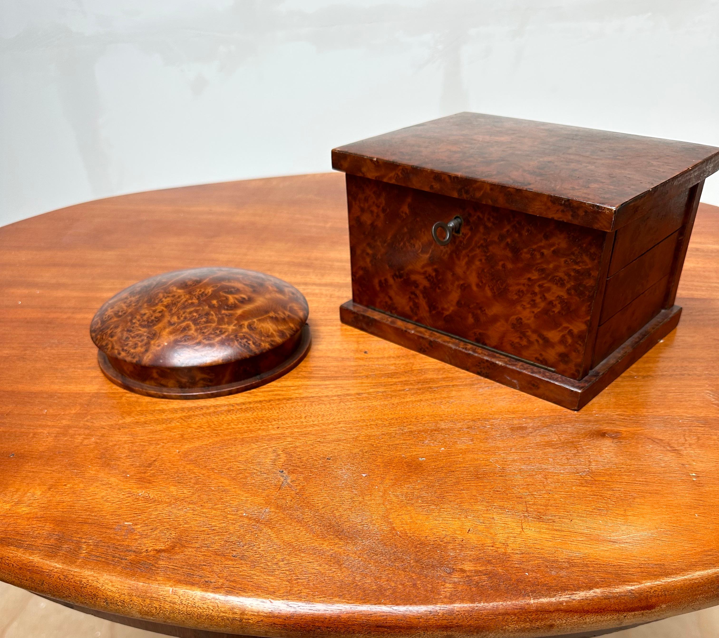 Clever and perfect condition 'pair' of antique jewelry boxes.

The burl or burr walnut that was used to create these two stunning boxes has delivered the most amazing details and patterns both on the exterior and interior and this exotic wood also