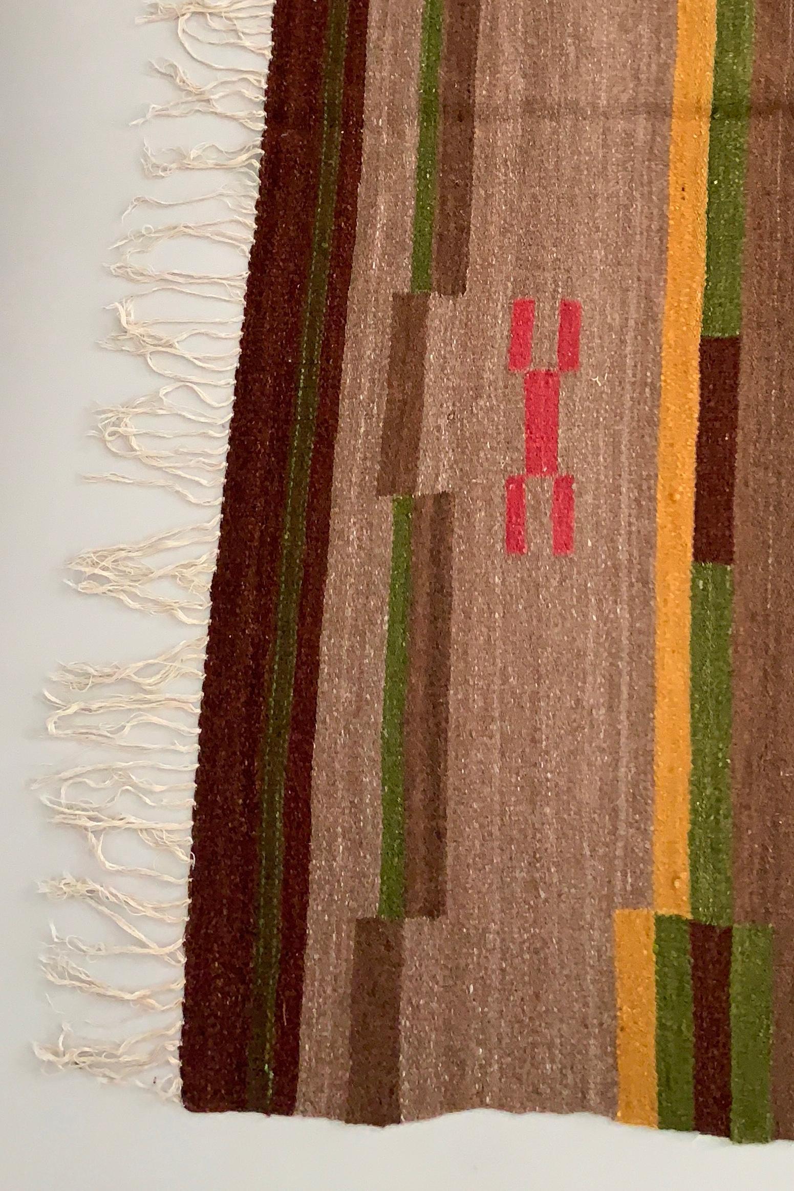 A handwoven functionalist rug.
Made in Finland circa 1930s.

310cm long by 220cm wide.