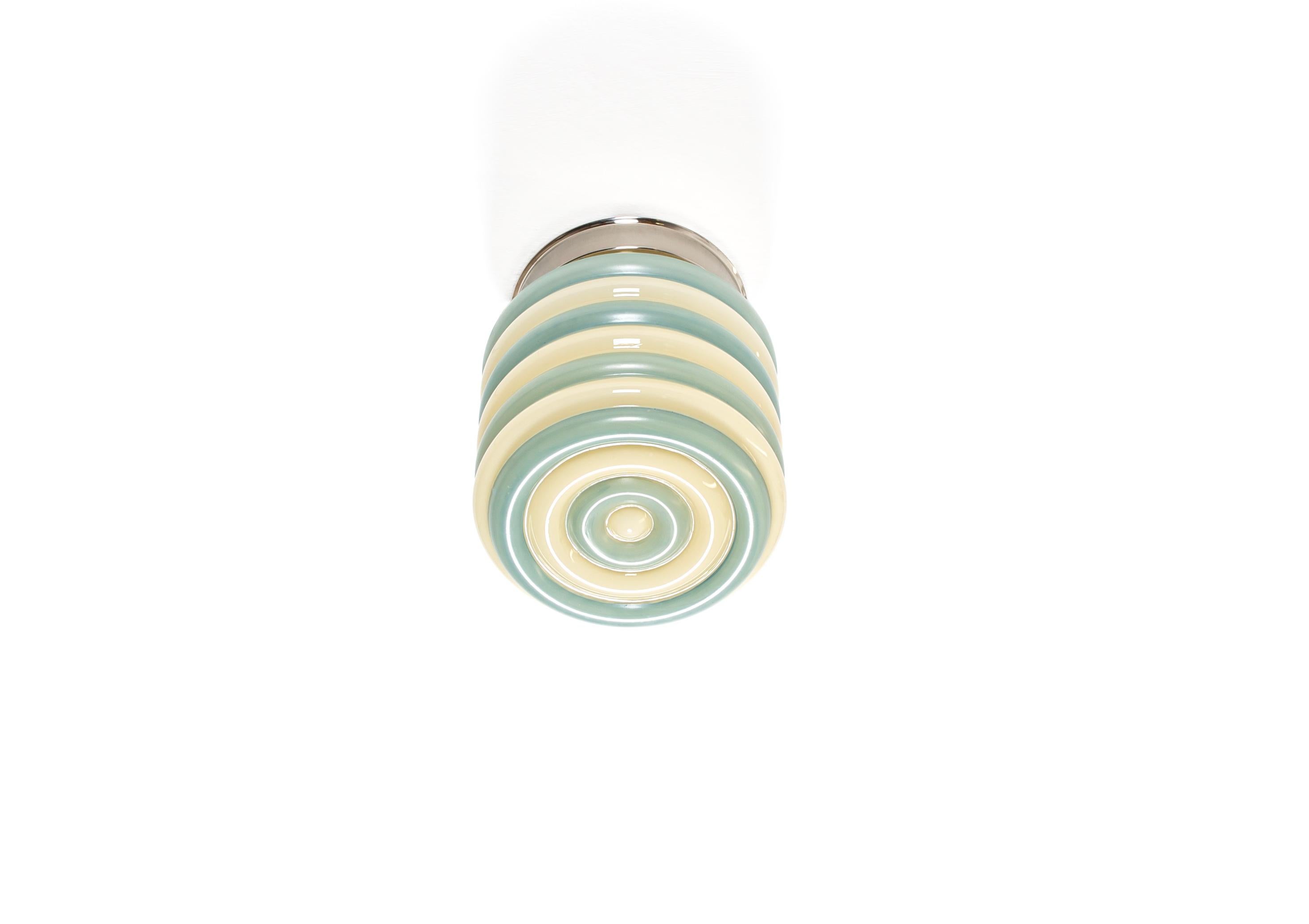 Wonderful and decorative ceiling light with embossed shade in opaline glass and chrome metal base. Designed and made in Norway from ca 1950s first half. The lamp is fully working and in good vintage condition. It is fitted with one E27 bulb holder