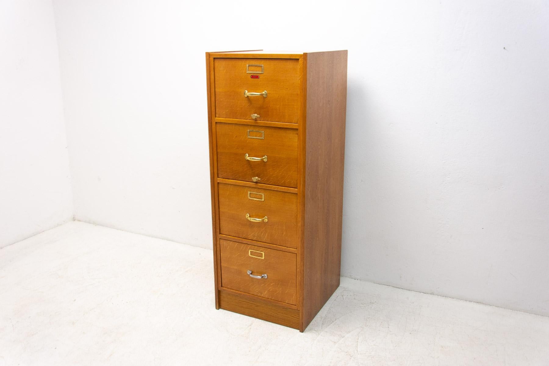 Functionalist Industrial filing cabinet, 1930s. Made in former Czechoslovakia.

 Material oak wood, plywood, general metal. In excellent condition after renovation.

Measures: Height: 147 cm

Lenght: 56 cm

Depth: 60 cm.