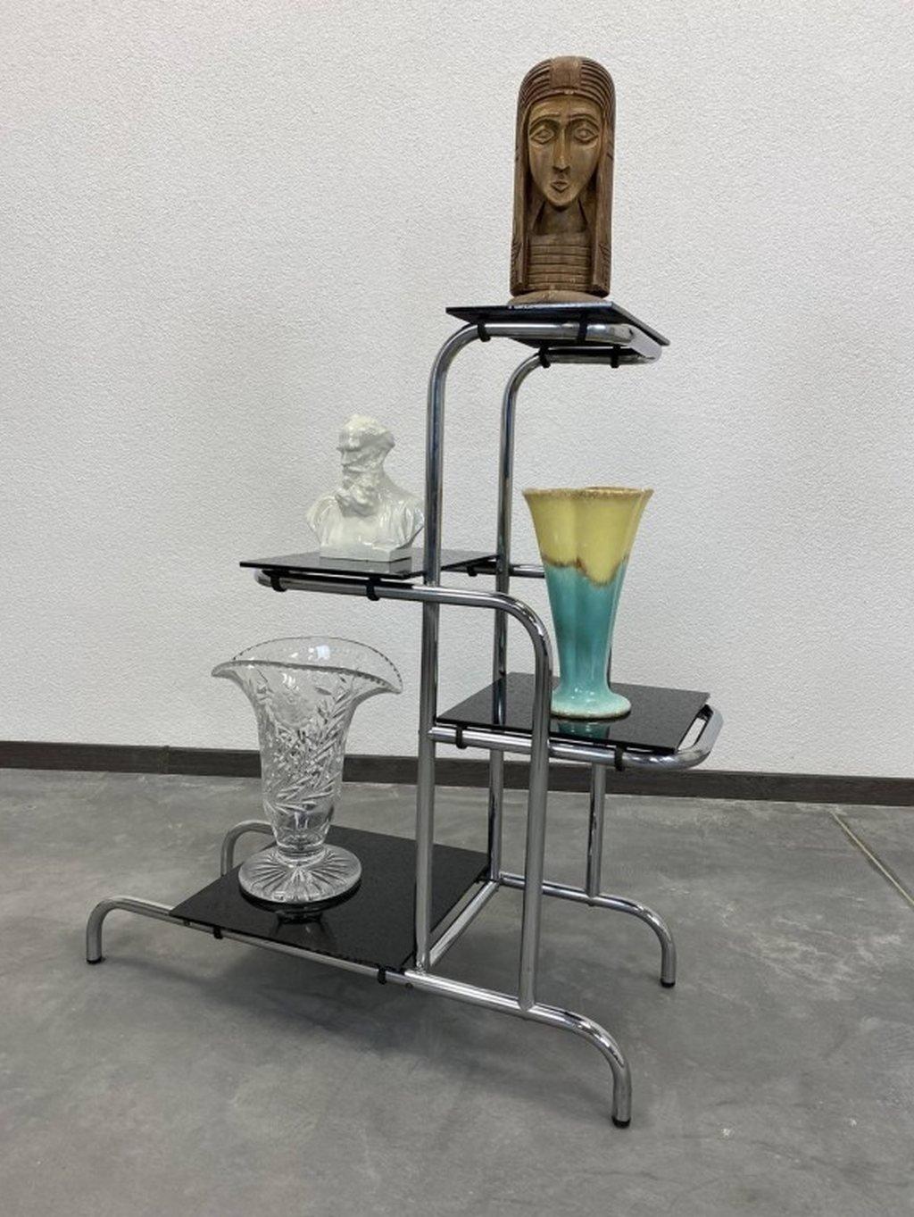 Functionalist plant stand by Emile Guyot for Thonet with black glass. Original very good condition with small signs of usage on glass parts.