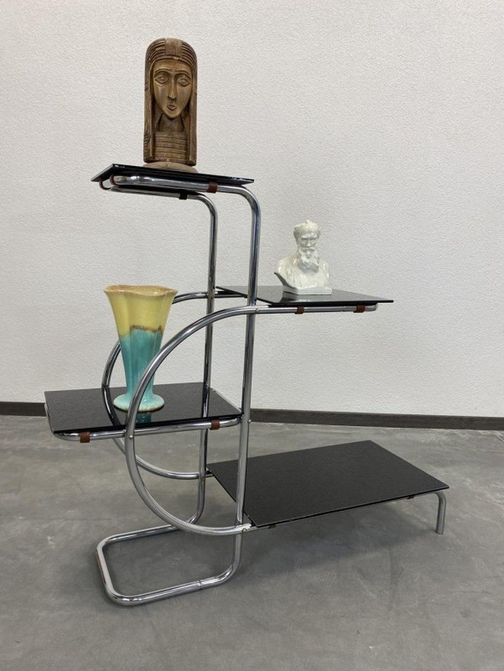 Functionalist steel plant stand by Emile Guyot with black glass. Very good original condition with signs of usage.