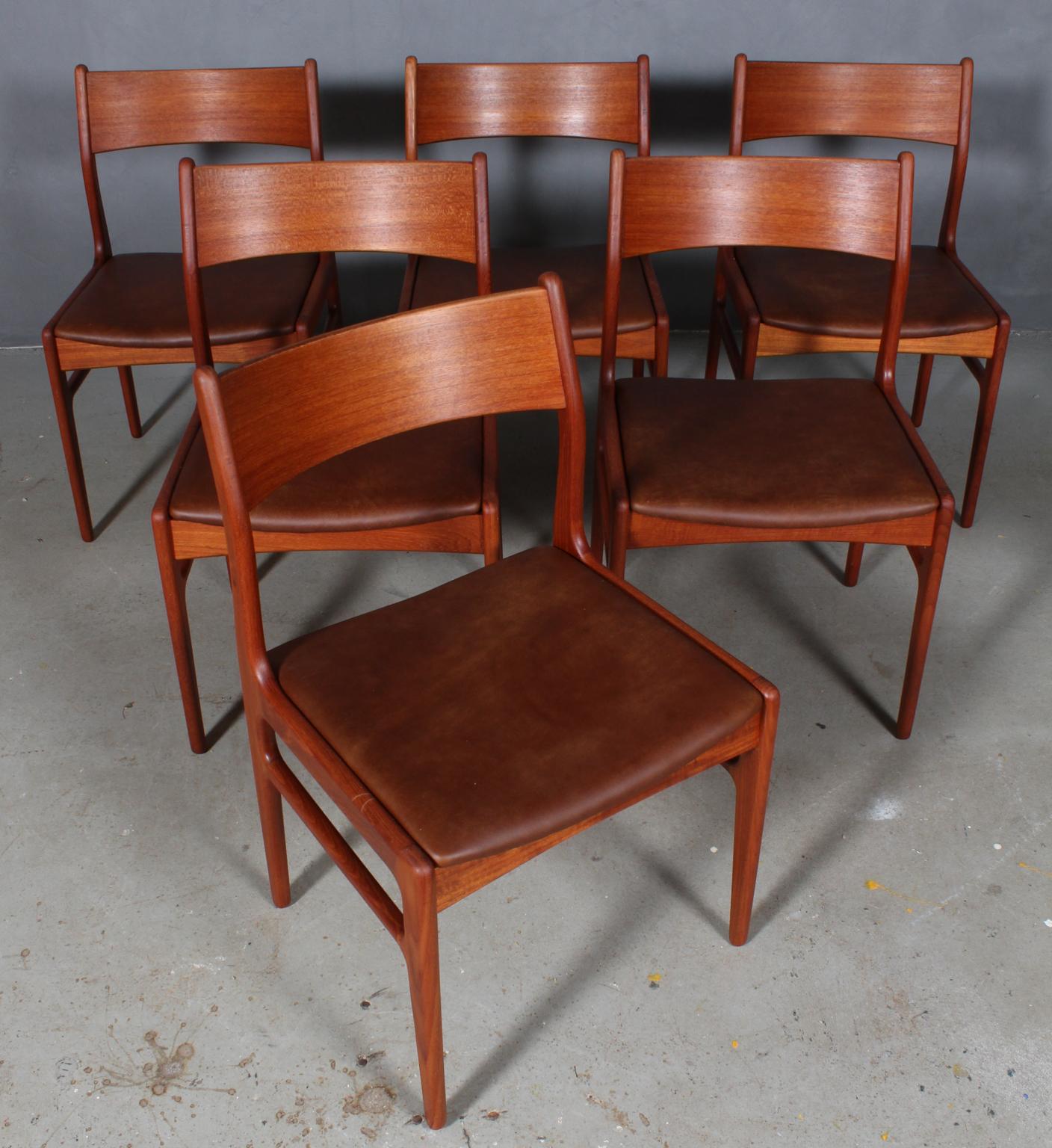 Funder-Schmidt & Madsen. Six dining chairs made of veneered and solid teak, seat later upholstered in mocha colored aniline leather, 1960s. Newly upholstered in mocha colored aniline leather with Danish upholstery in Denmark.
 
  
