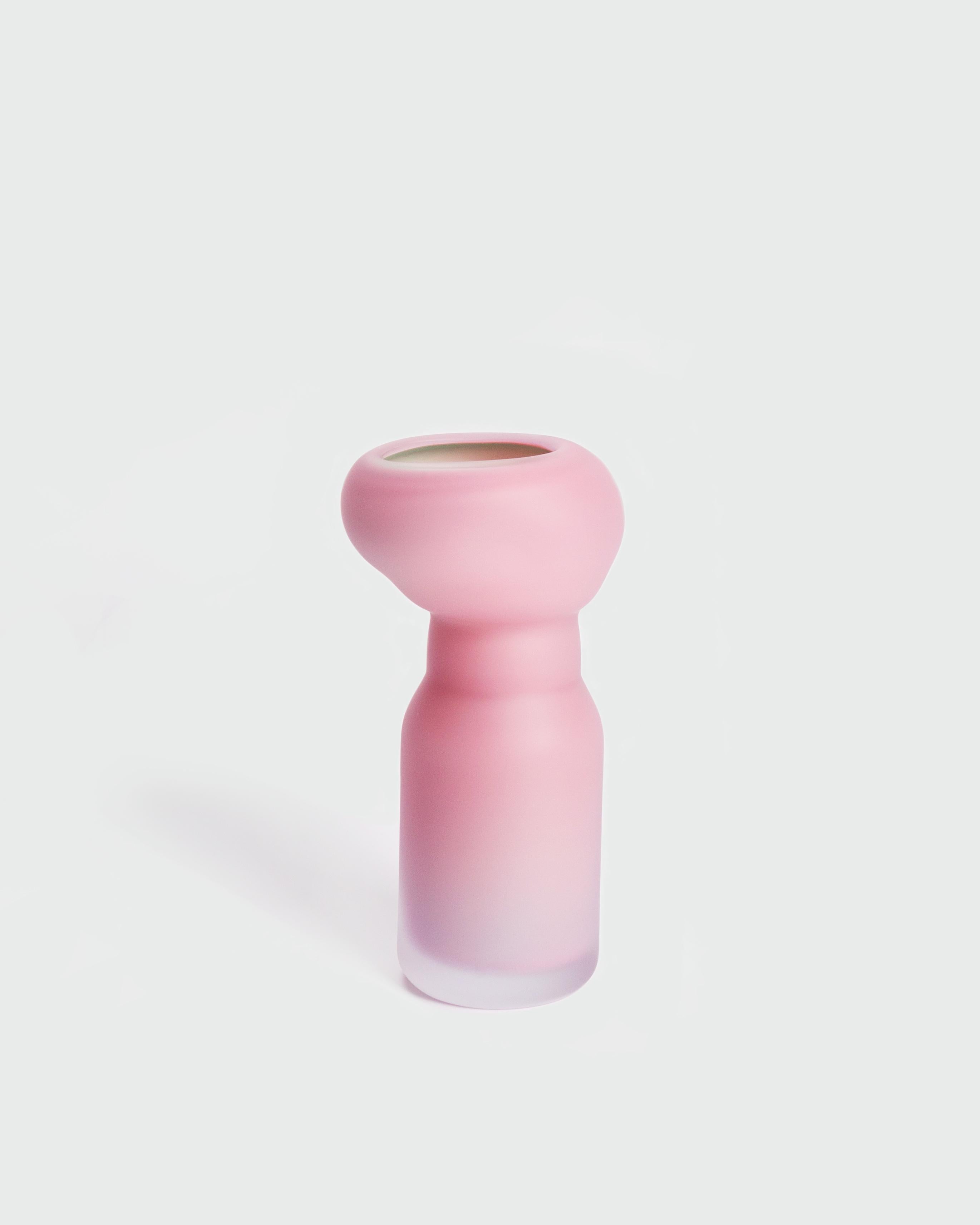 Fungus Medium Vase by David Valner
Dimensions: D 16 x W 17 x H 35 cm.
Materials: Glass.
Weight: 3,5 kg.
Finish: Medium size, pink and mint, and matte surface.

“The mystery of mycelia speaking through glass”

Fungi and moulds are organisms