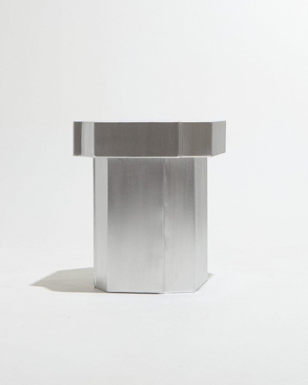 Funki stool in brushed aluminum by Louise Roe. Made in Portugal.
The Funki Furniture series by Louise Roe is a versatile collection that includes a bench, rectangular and square coffee tables, and two stools in different sizes. Whether used as a