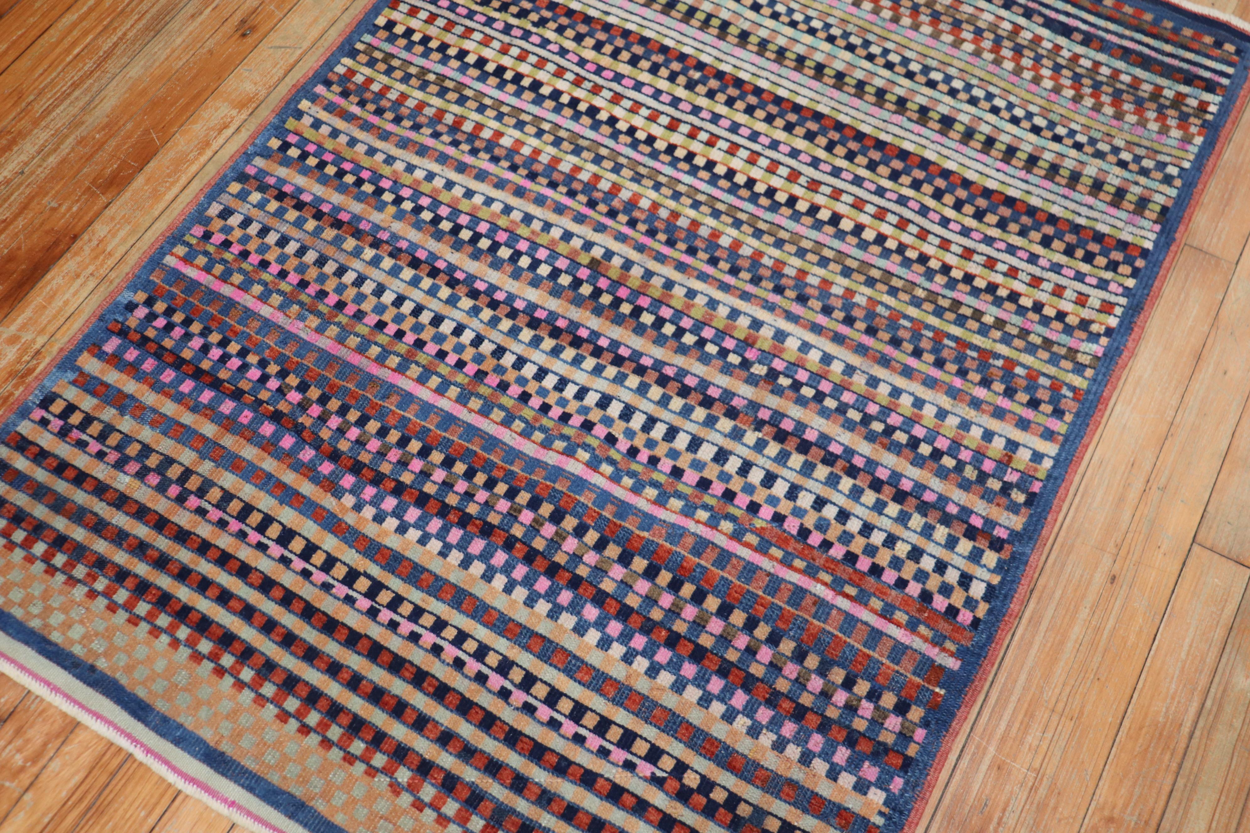 A vintage Turkish Deco rug mat with a repetitive striped small box design in an array of colors. Fun and real hip

Measures: 3'2' x 4'5