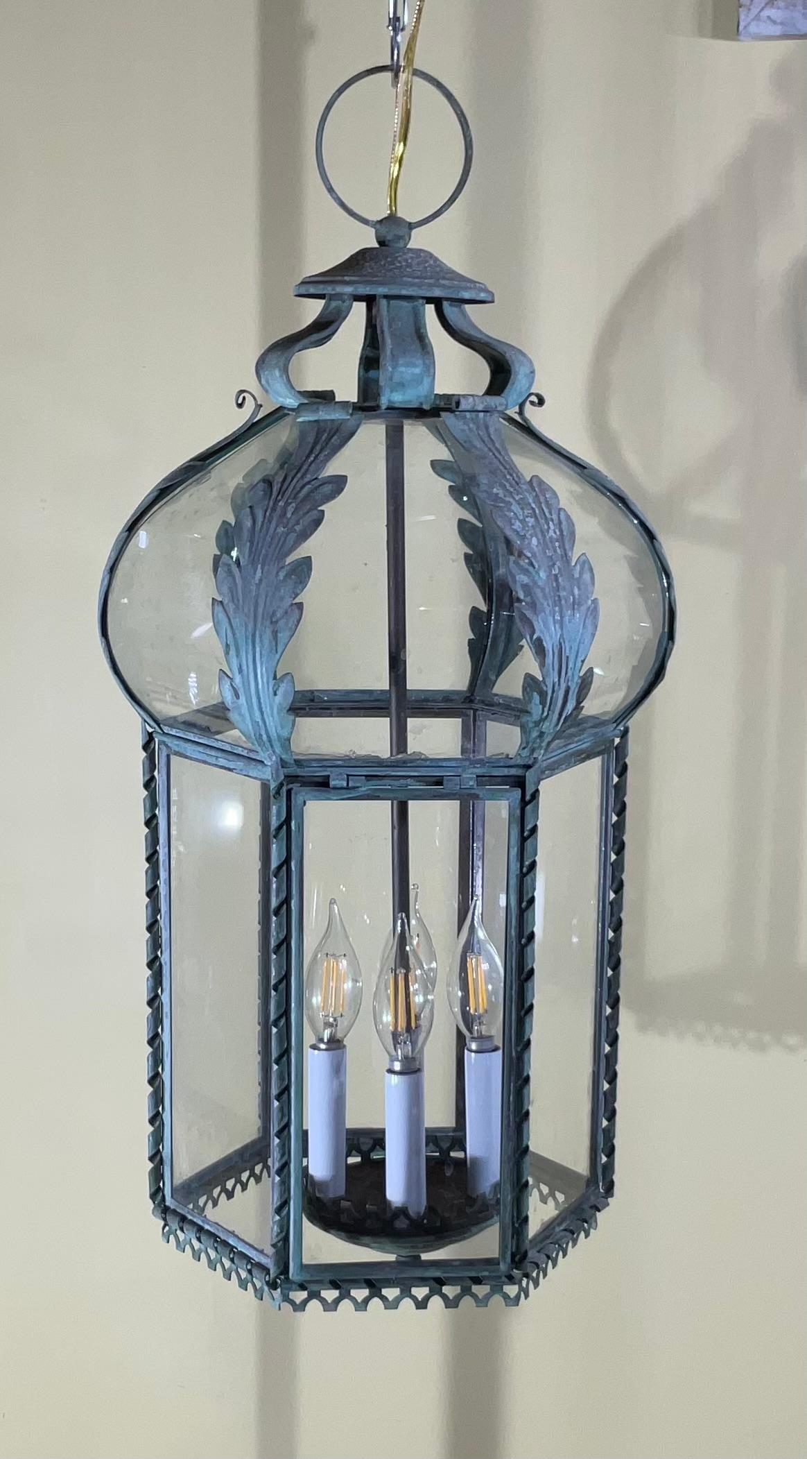 Elegant and artistic antique pendant / chandelier/ lantern made of copper, twisted columns ,decorative trimmings and doom shape top.  with four 40/watt lights . Great lights exposure.
ready to use.
Not for use in wet location .
Brass canopy included.
