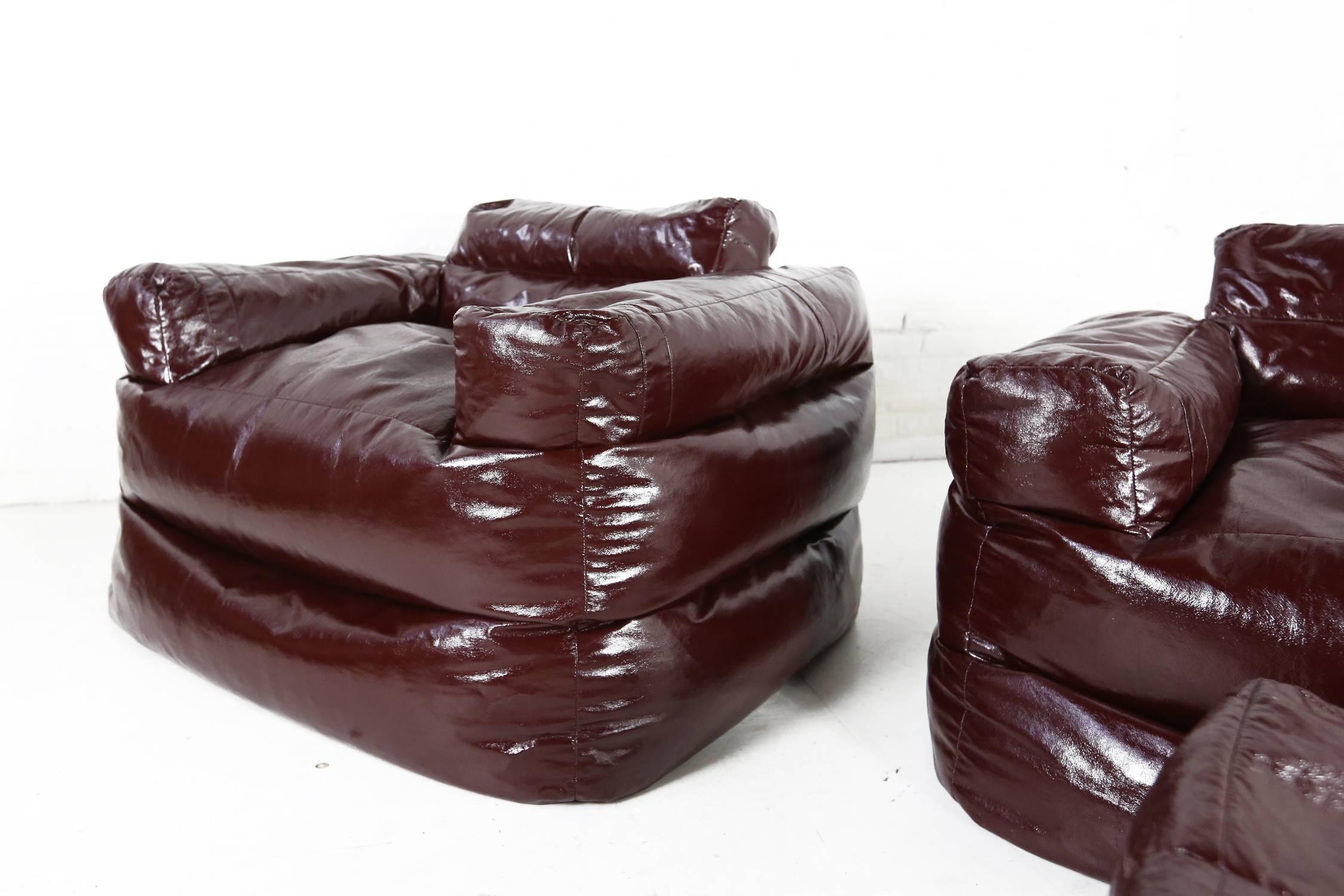 Funky and comfortable Italian bean bag chairs (Two) and one footstool in vinyl dating from the 1970s in very good condition.

 