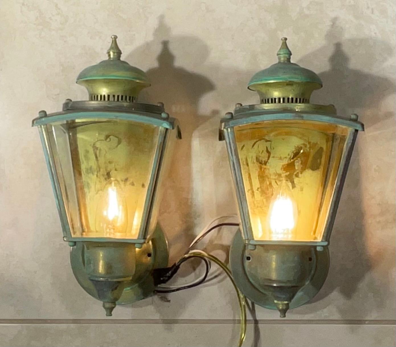 
Instantly elevate your home's curb appeal or interior space with this  pair of vintage solid brass exterior/interior wall lanterns. Their classic design and beautiful finish make them an incomparable affordable statement piece.
 Classic