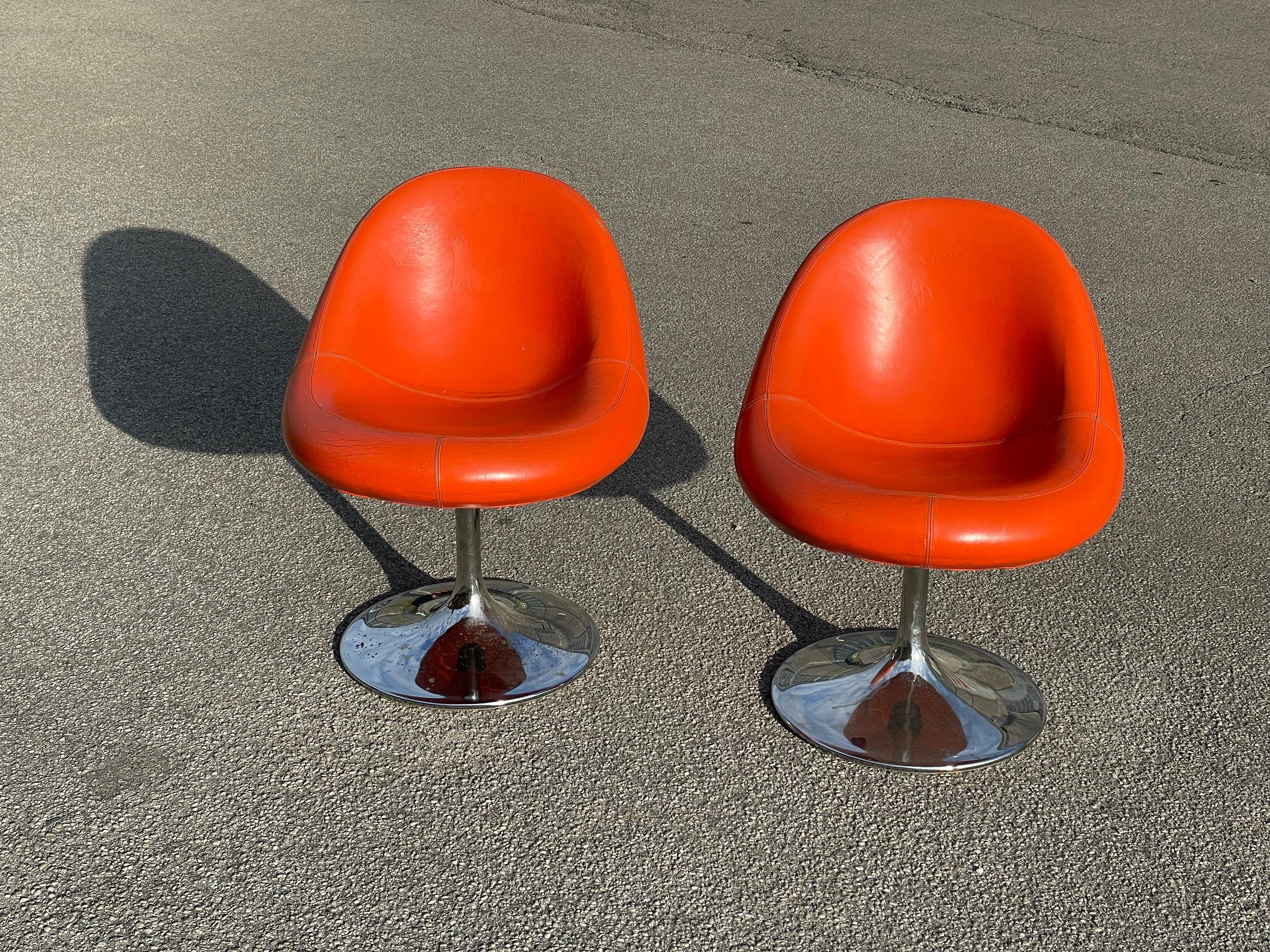 A rare pair of original orange leather chairs with chrome tulips feet by Börje Johnson Design (Sweden)
 1960.