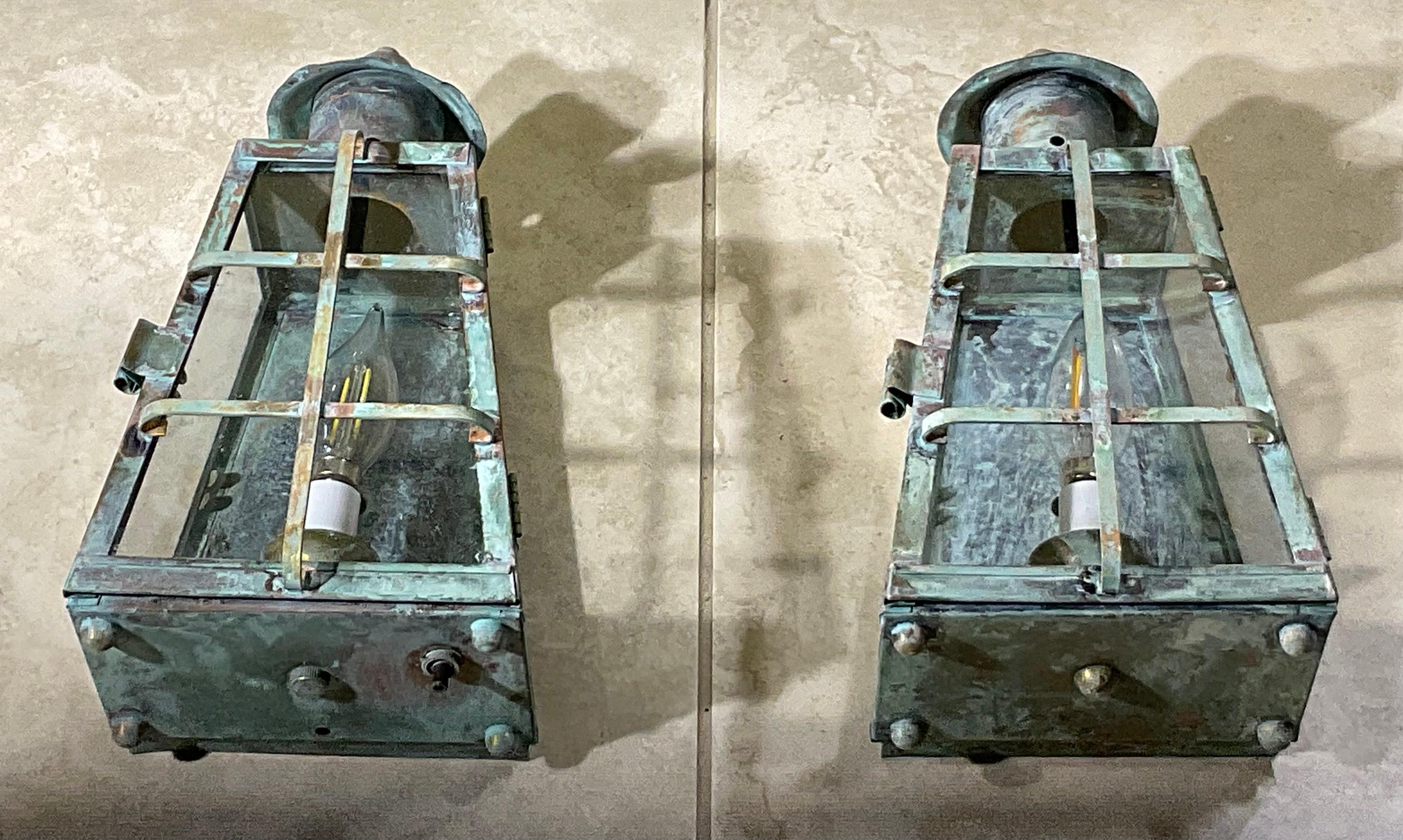 American Funky Vintage Pair of Solid Patinated Brass Wall Lanterns For Sale