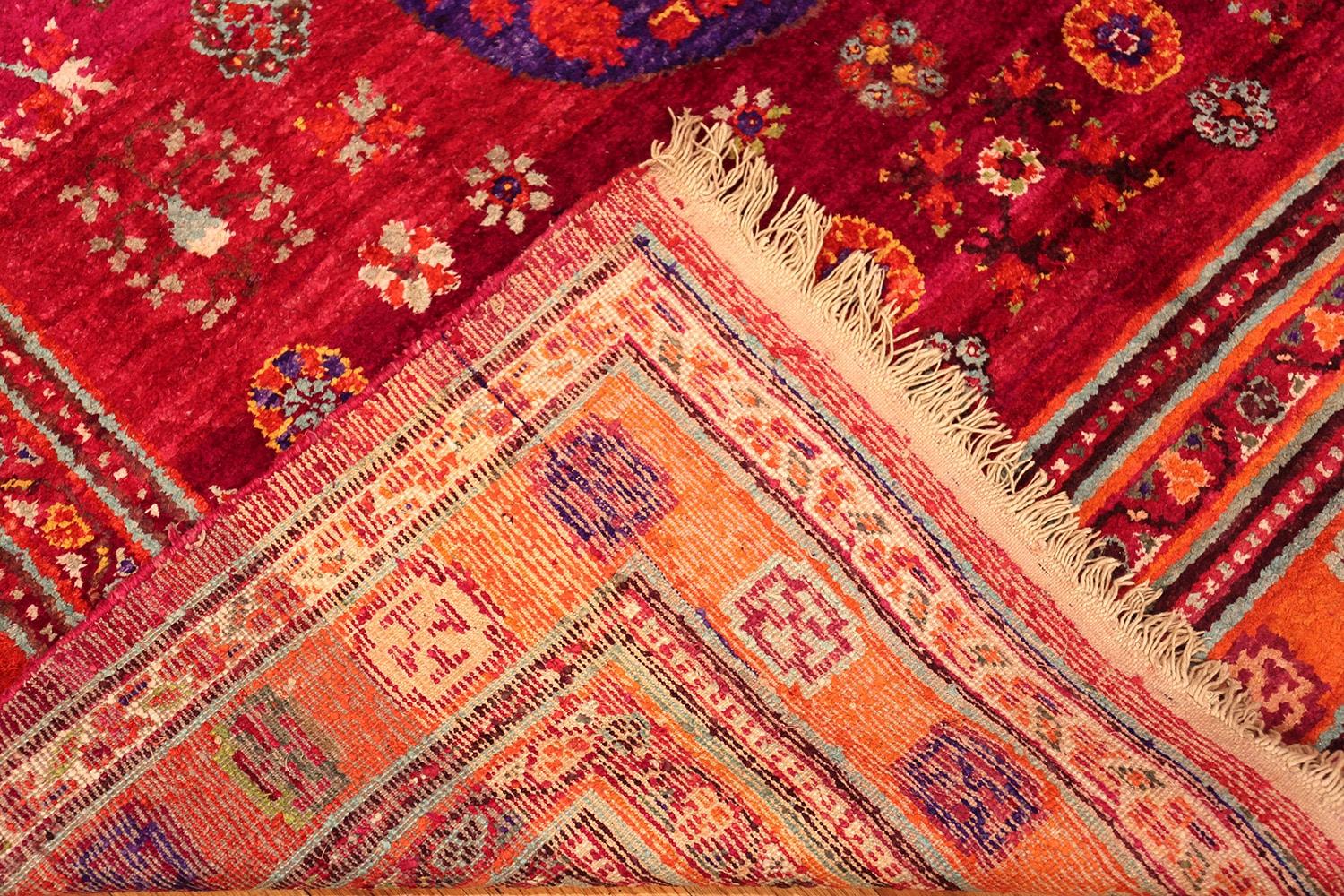 An Exciting Artistic and Funky Vintage Purple Pomegranate Design Silk Khotan Rug, Country of Origin / Rug Type: East Turkestan Rugs, Circa Date: Vintage / Mid 20th Century. Size: 5 ft 10 in x 11 ft 4 in (1.78 m x 3.45 m)

