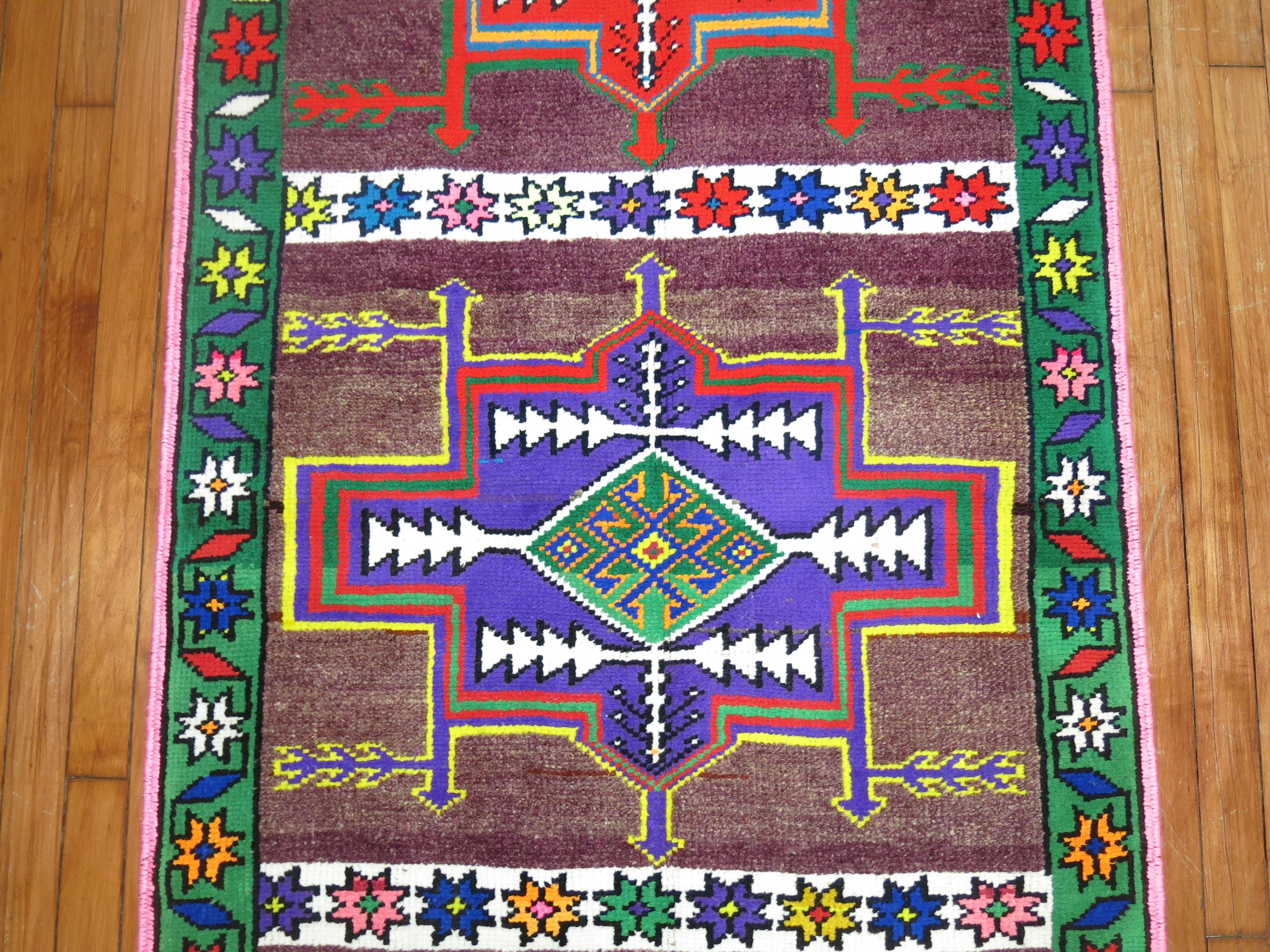 Turkish Anatolian runner from the middle of the 20th century with a funky pattern and coloration

Measures: 3' x 11'2''