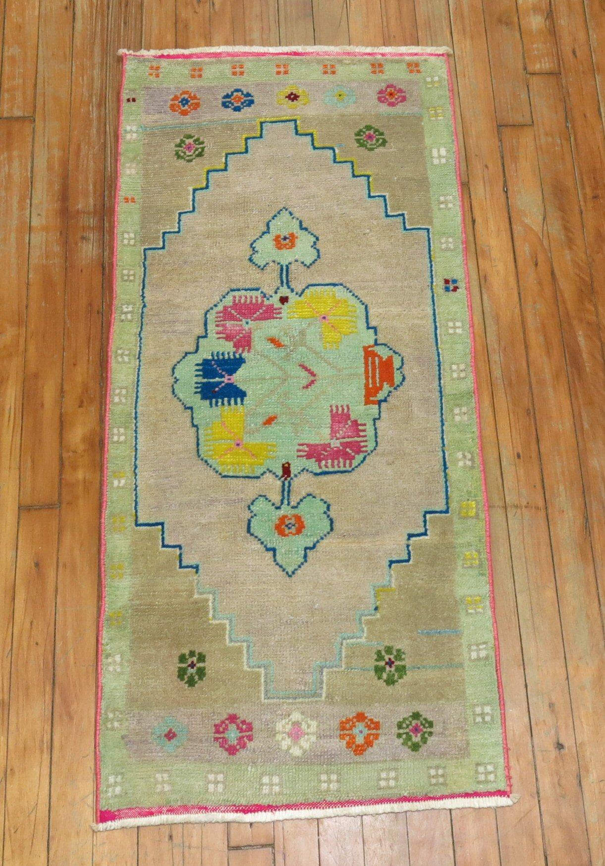 One of a kind vintage Turkish mat from the 20th century. All you got to do is look at the colors!

Size: 1'10” x 3'10”.