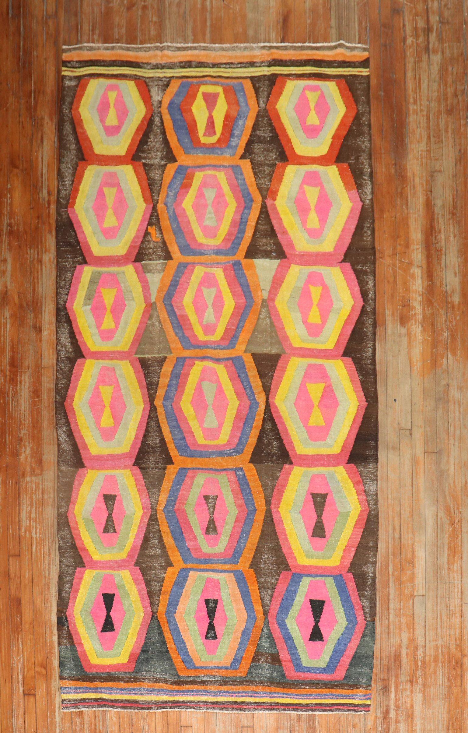 One of the funkiest colored kilims we have ever acquired in a gallery size format

Measures: 5