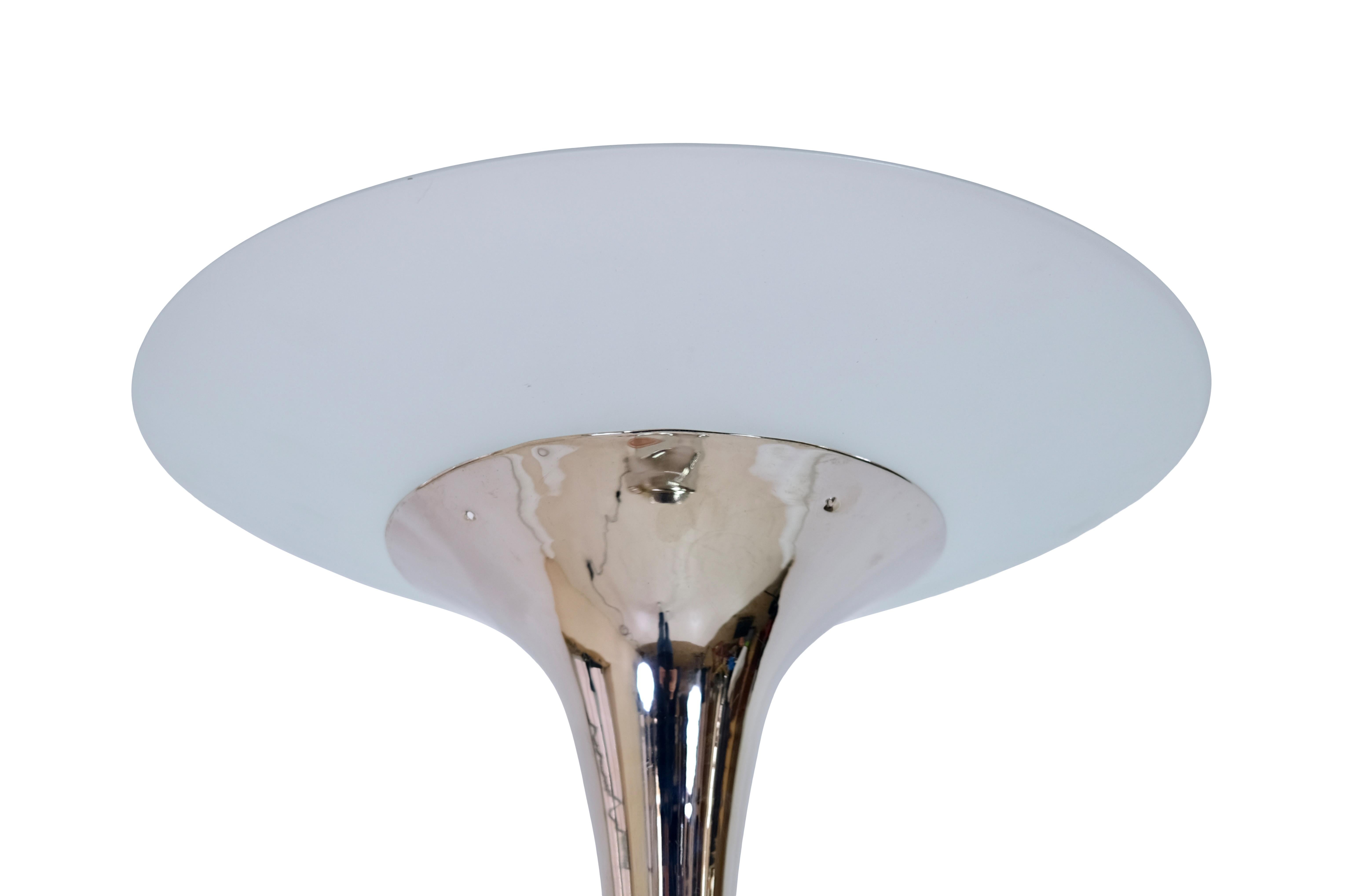 Floor lamp with funnel shaped ceiling floodlight and satin glass ring.
Fresh nickel plated.
Orange glass rings in the stem.

Original Art Deco, France 1930s.

Measurements: 
Diameter, shade: 48 cm
Diameter, base: 33 cm
Height: 180 cm.