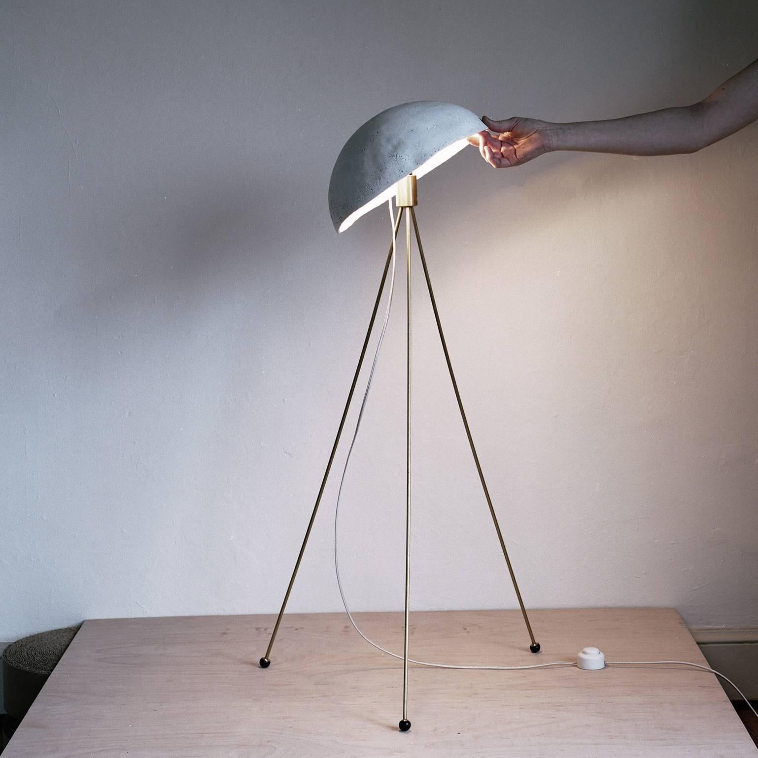 Funny Buddy Floor Lamp with Concrete Noggin and Brass Tripod Legs 1